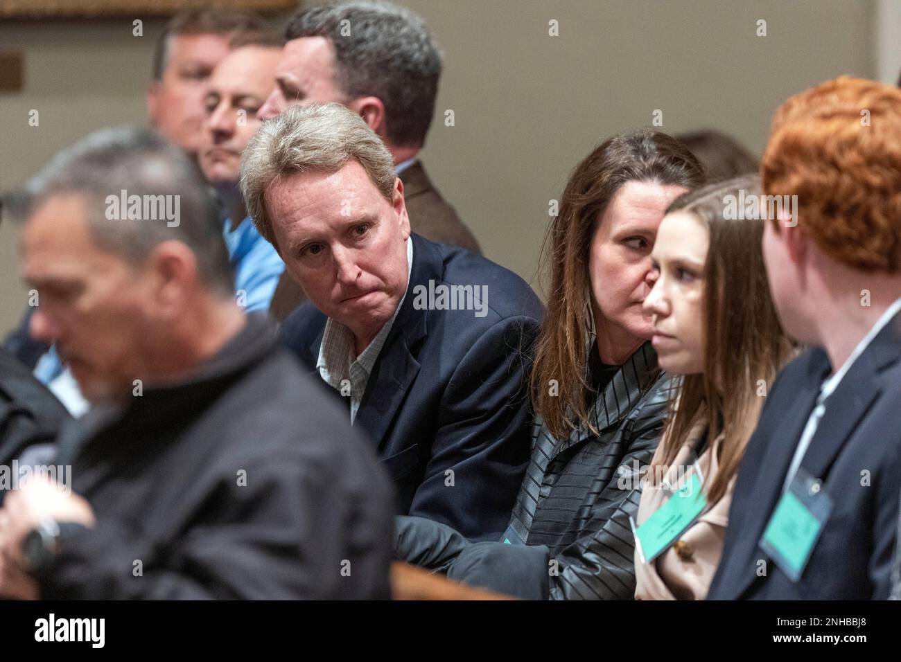 John Marvin Murdaugh looks over to his family before opening statements ...