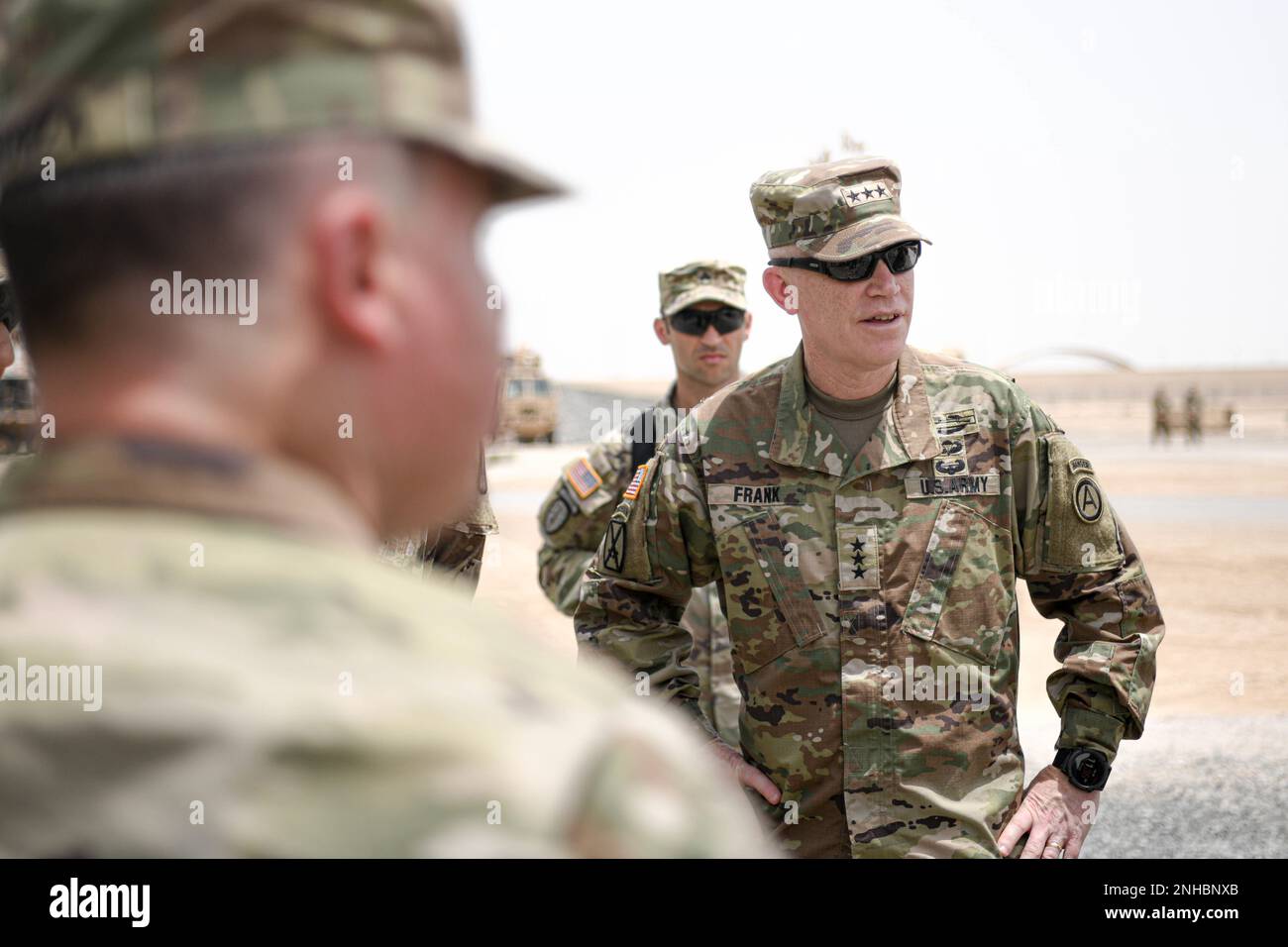 Lt. Gen. Patrick D. Frank, the commanding general of U.S. Army Central, meets with the 4-3 Air Defense Artillery Regiment July 28,2022, at Al Dhafra Air Base, United Arab Emirates. The 4-3 ADA's mission is to neutralize aerial threats, in partnership with their host nation counterparts, and provide air and missile defense for critical assets. Stock Photo