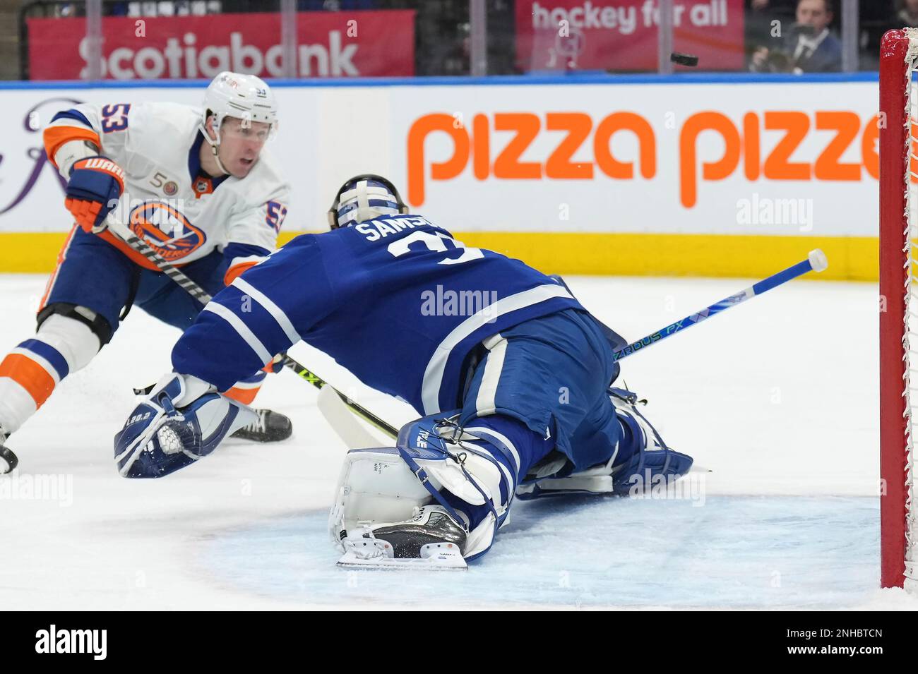 Toronto Maple Leafs goaltender Ilya Samsonov, right, makes a save ...