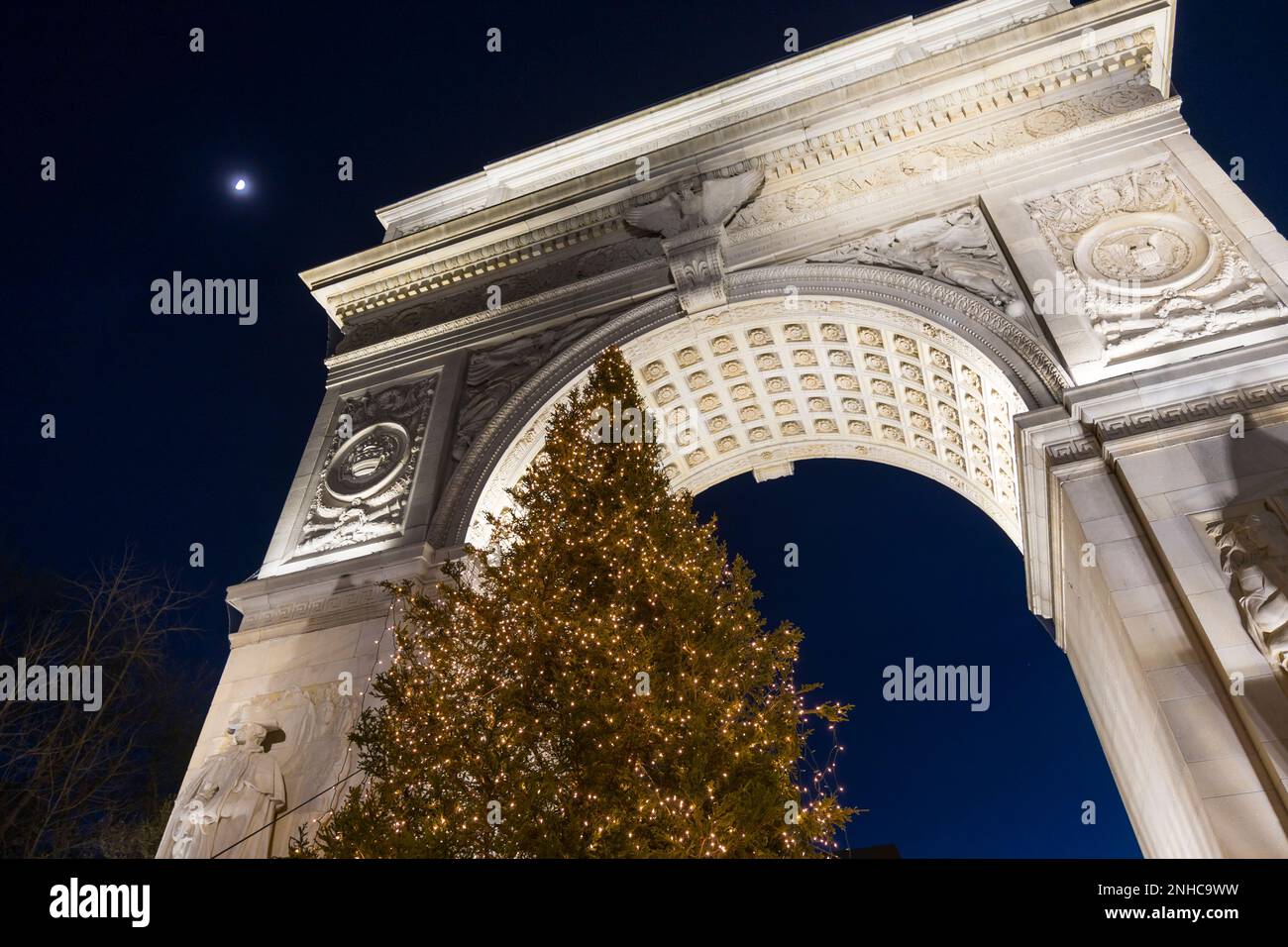 Christmas Tree stands in front of the Washington Square Arch in New York City Stock Photo