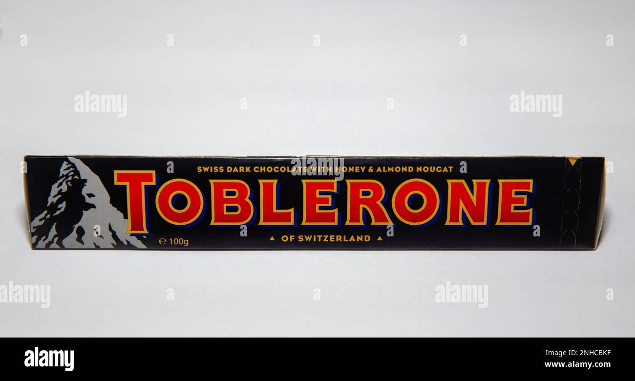 Traditional dark toblerone chocolate isolated in selective focus Stock