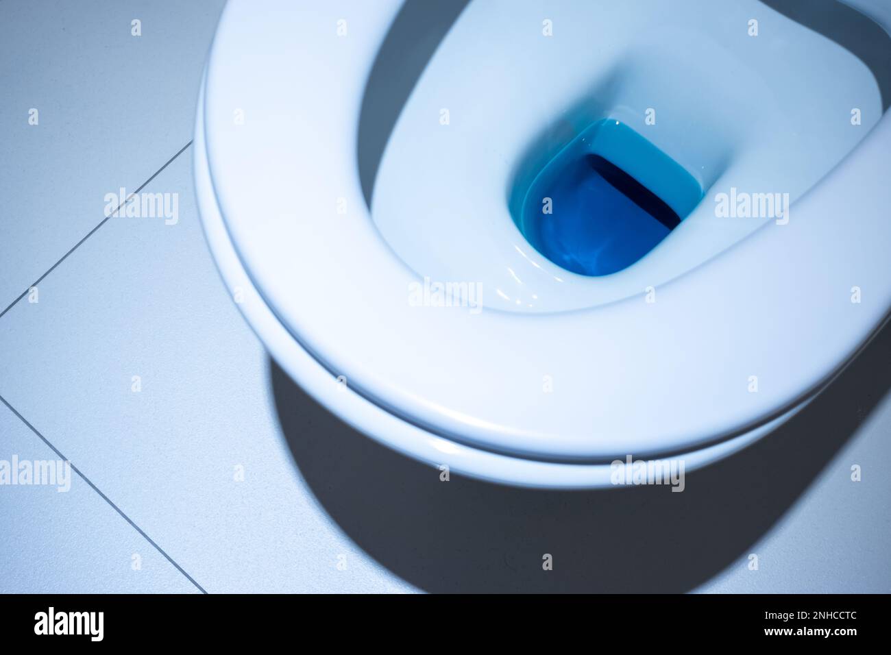 Close up view inside the toilet bowl in the toilet. Bathroom finished