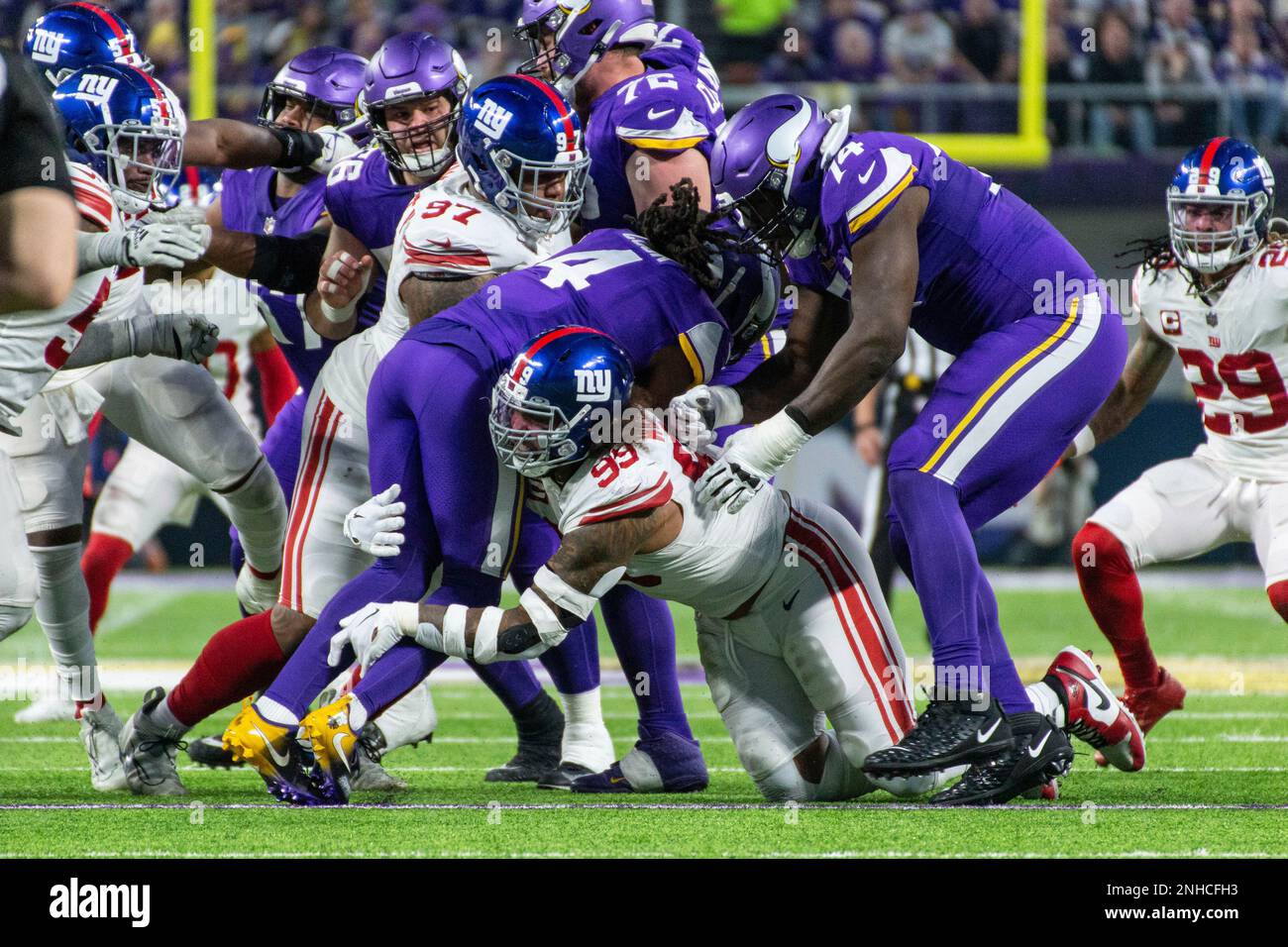 MINNEAPOLIS, MN - JANUARY 15: Minnesota Vikings running back Dalvin Cook  (4) gets tackled by New York Giants defensive end Leonard Williams (99)  during the NFL game between the New York Giants