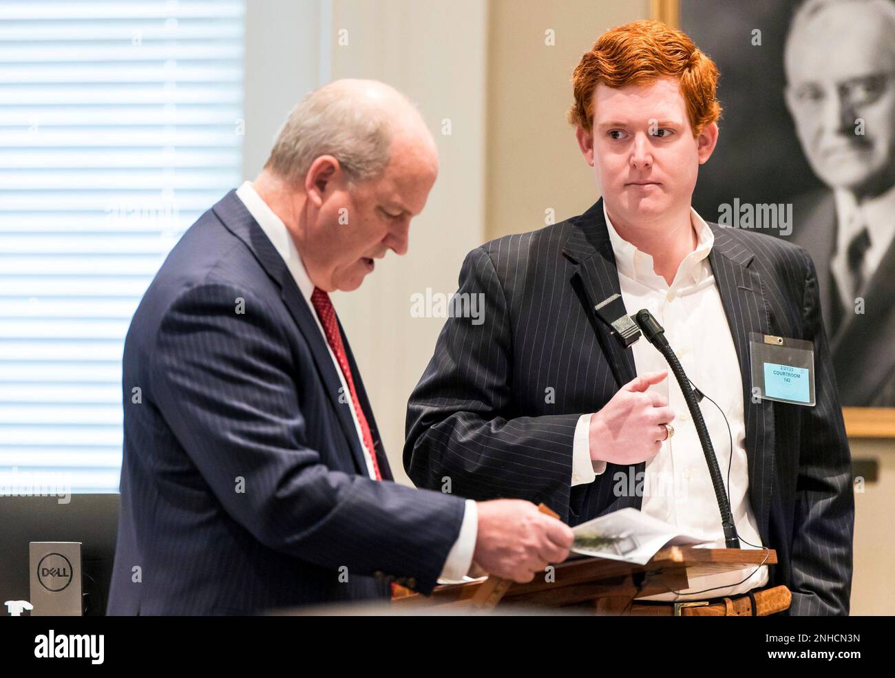 Buster Murdaugh, right, the son of Alex Murdaugh, listens to a