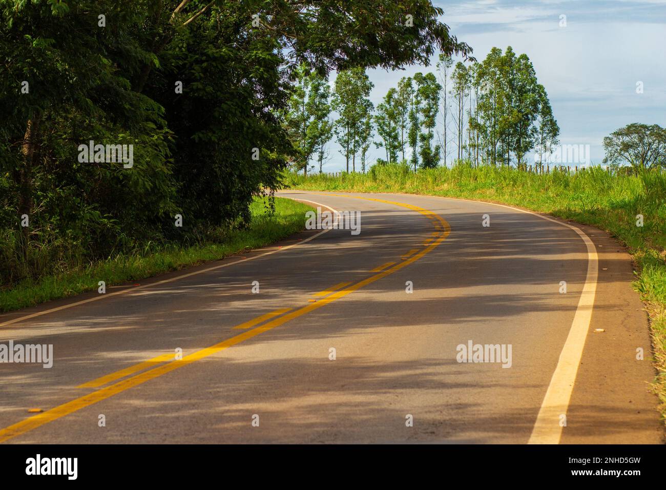 Goiania, Goias, Brazil – February 21, 2023: A section of the GO-462 highway where there is a curve in the road. Stock Photo