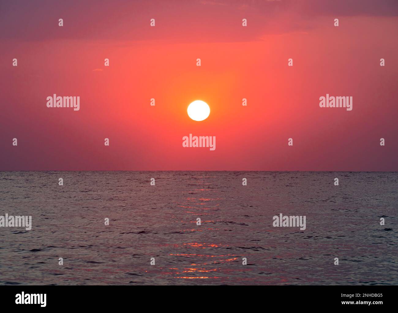 big sun down over sea sunrise, red sky Stock Photo - Alamy