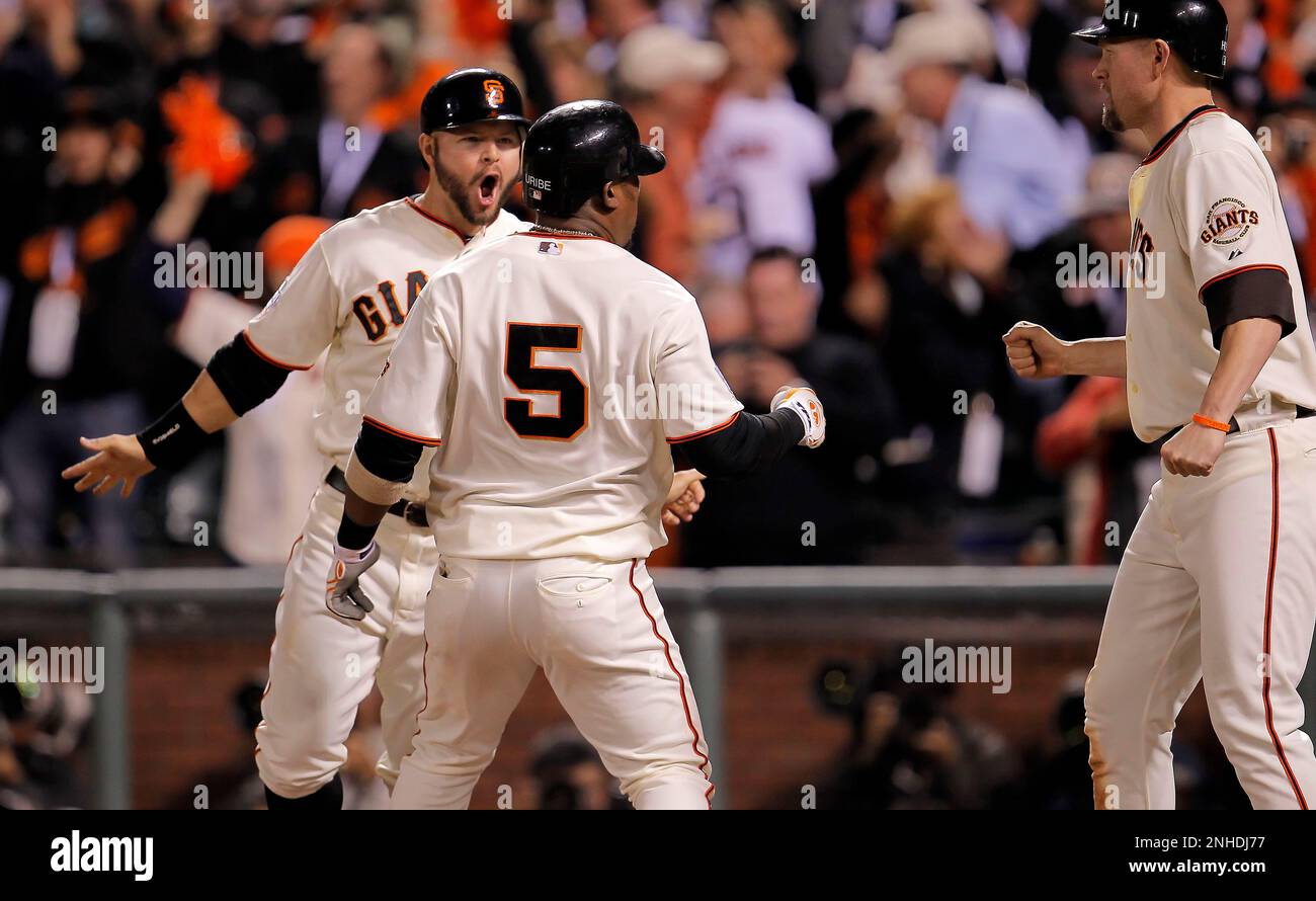 Cody Ross, (left) celebrates the 3 run home run by Juan Uribe, (5 ...