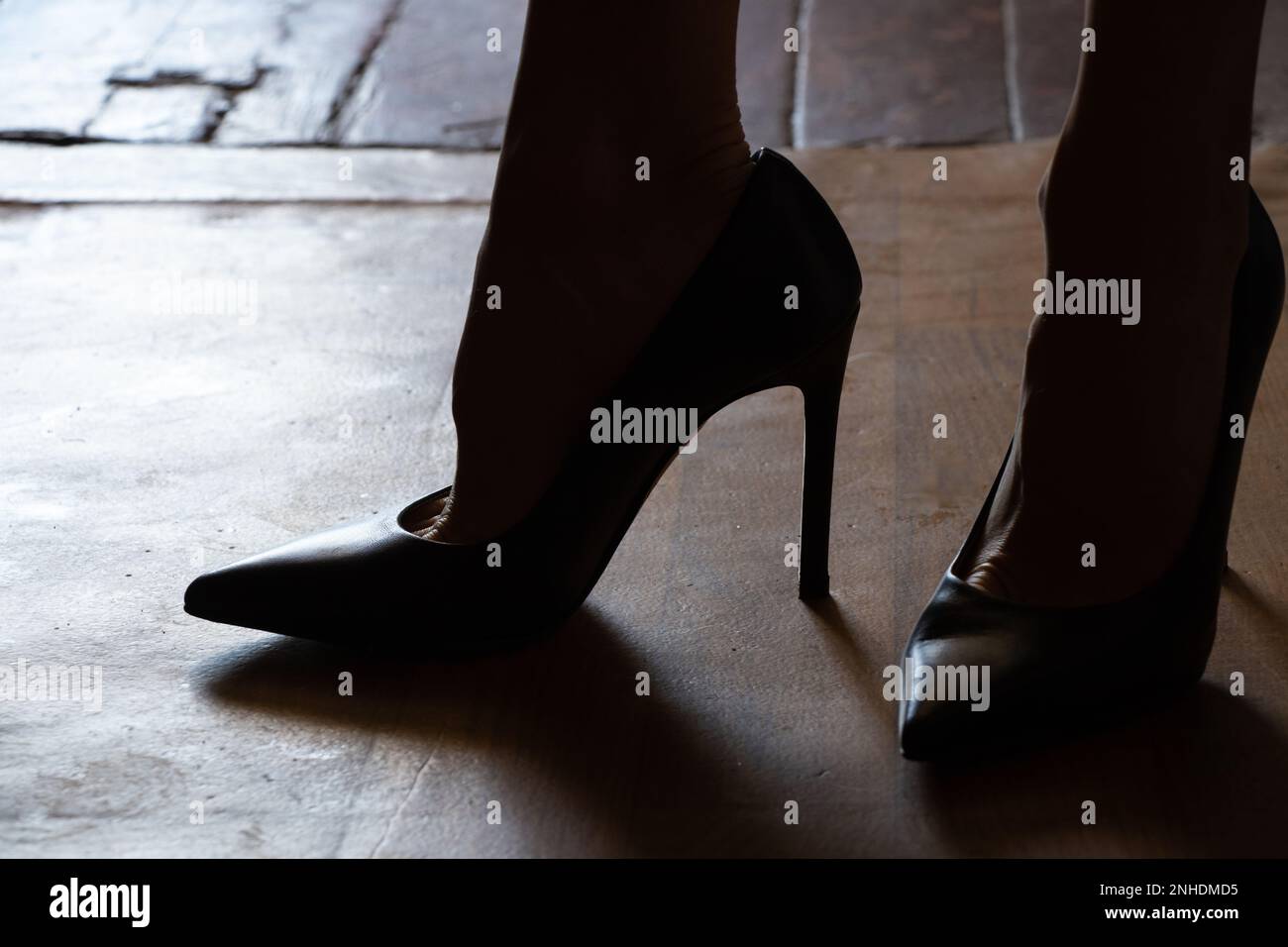 Woman standing feet office hi-res stock photography and images - Alamy