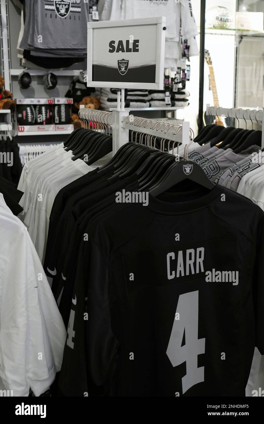 A clearance sale on the jerseys of Las Vegas Raiders quarterback Derek Carr  (4) at the Raider Image team store at the Harry Reid International Airport,  Saturday, Jan. 14, 2022, in Las