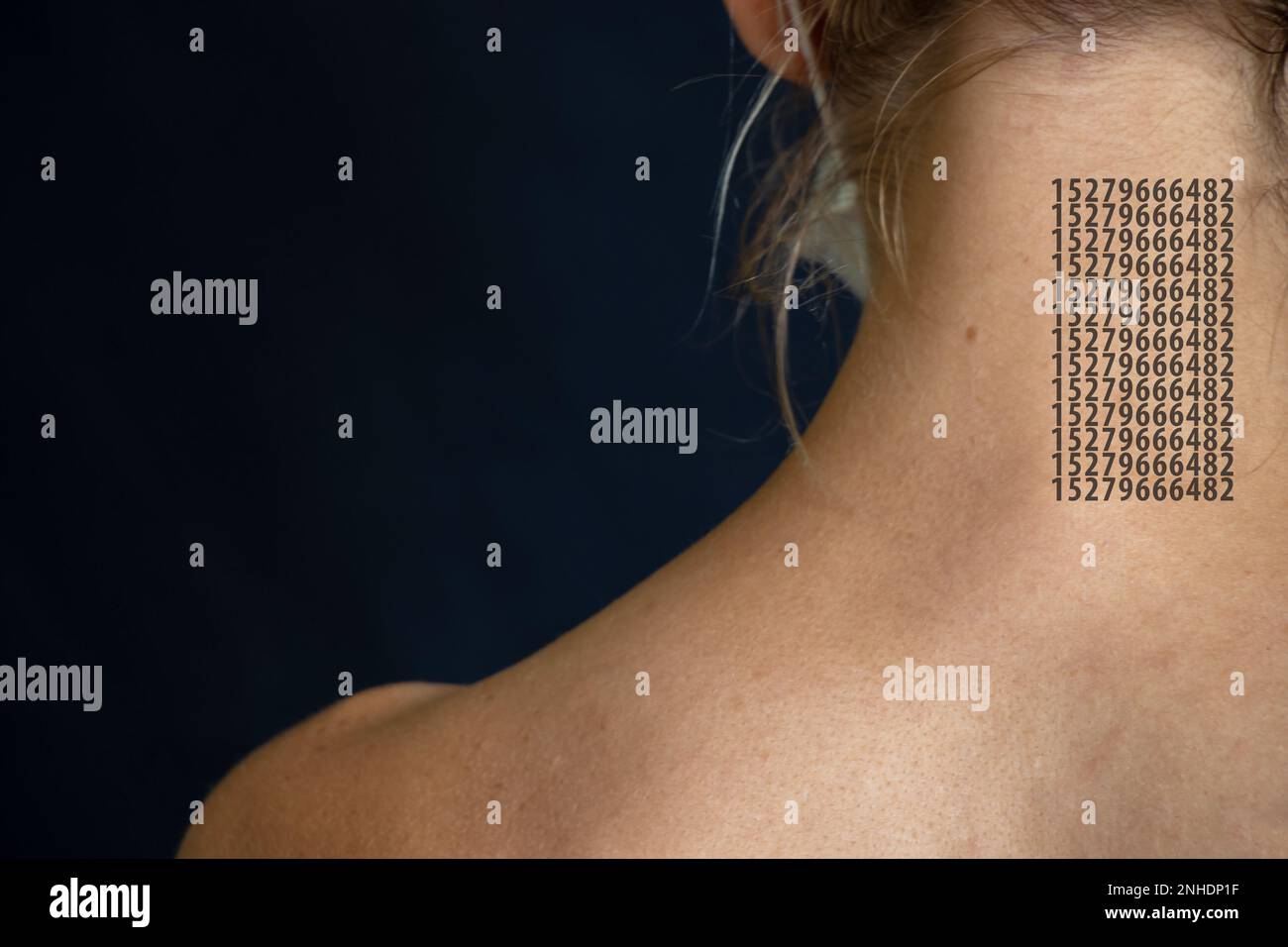 a series of numbers on a woman's body, the law on assigning a number to a person, assigning a number to a person Stock Photo