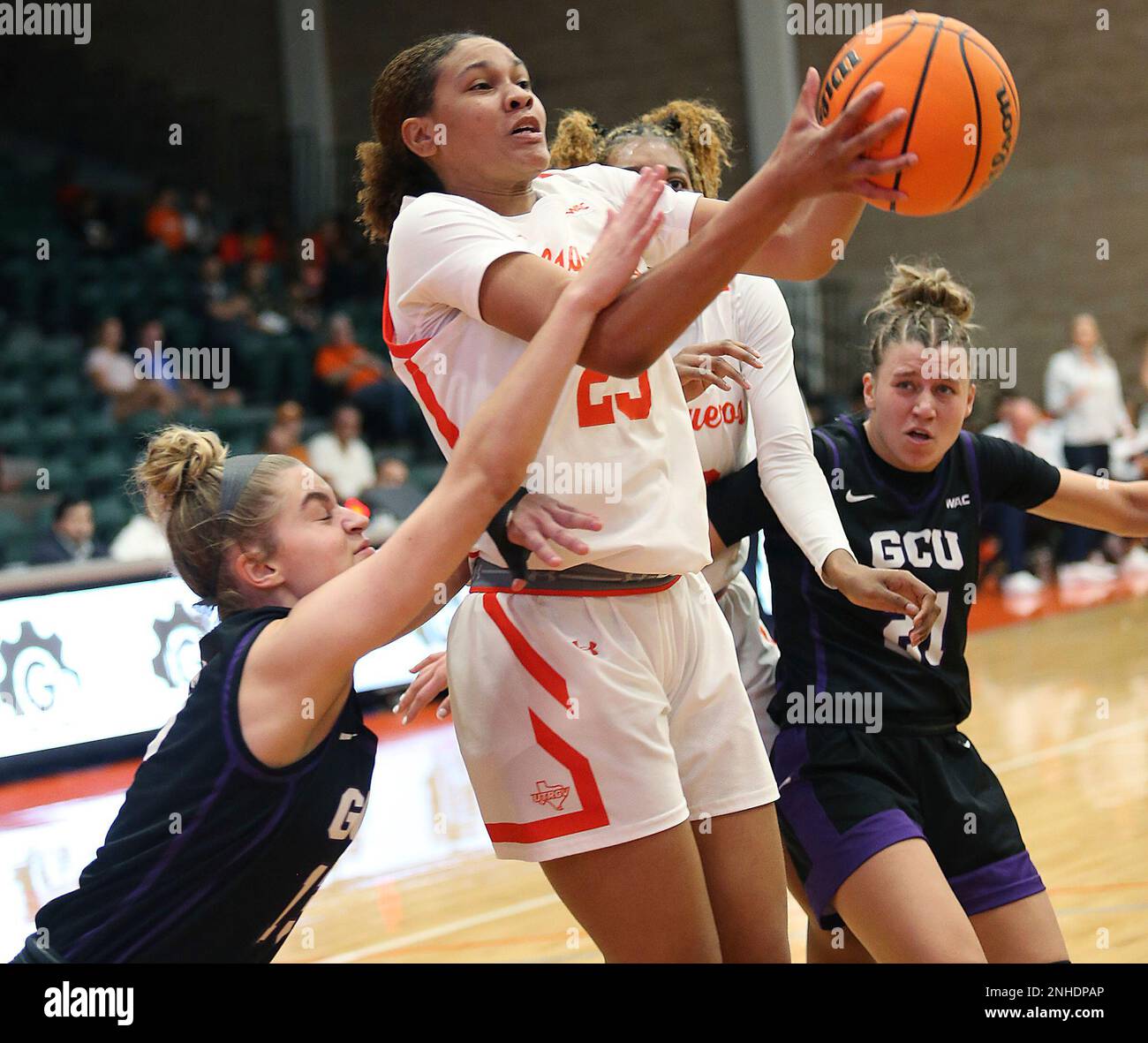 Texas-Rio Grande Valley's Tiffany McGarity, center, goes up for a score ...