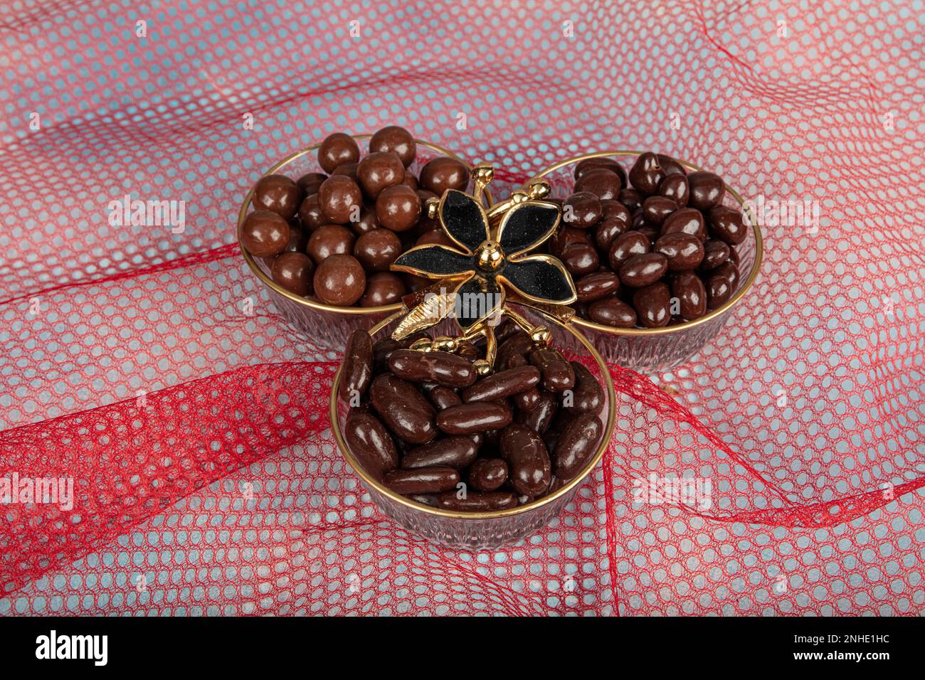 Chocolate dragee in luxury candy cane.chocolate glazed almonds
