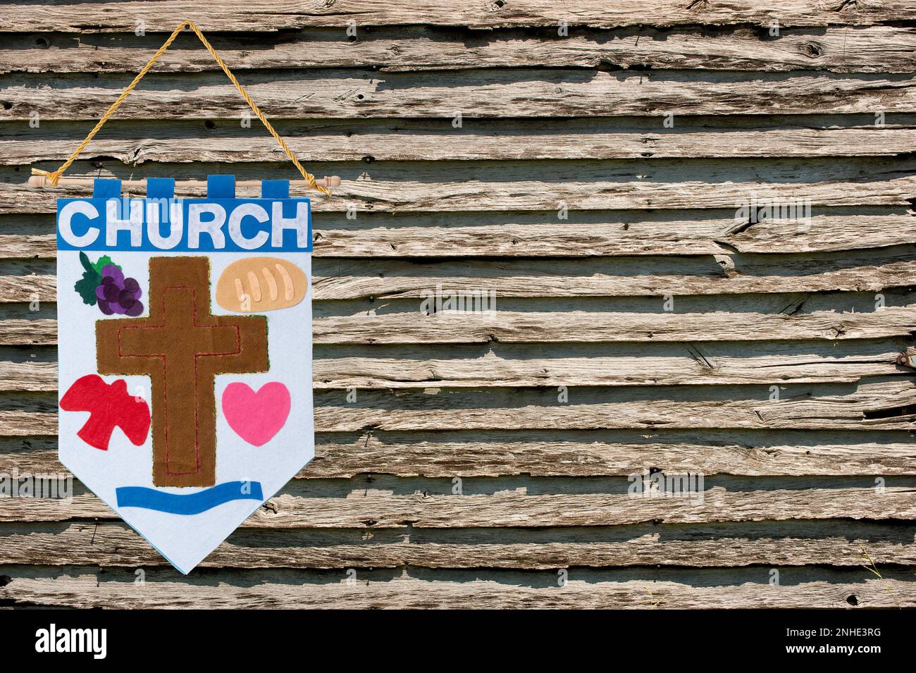Horizontal shot of a Church Banner announcements on the left side with wooden background effect.  Lots of copy space. Stock Photo