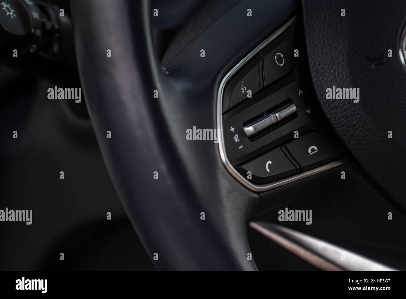 Volume and audio control buttons on the steering wheel. Car audio