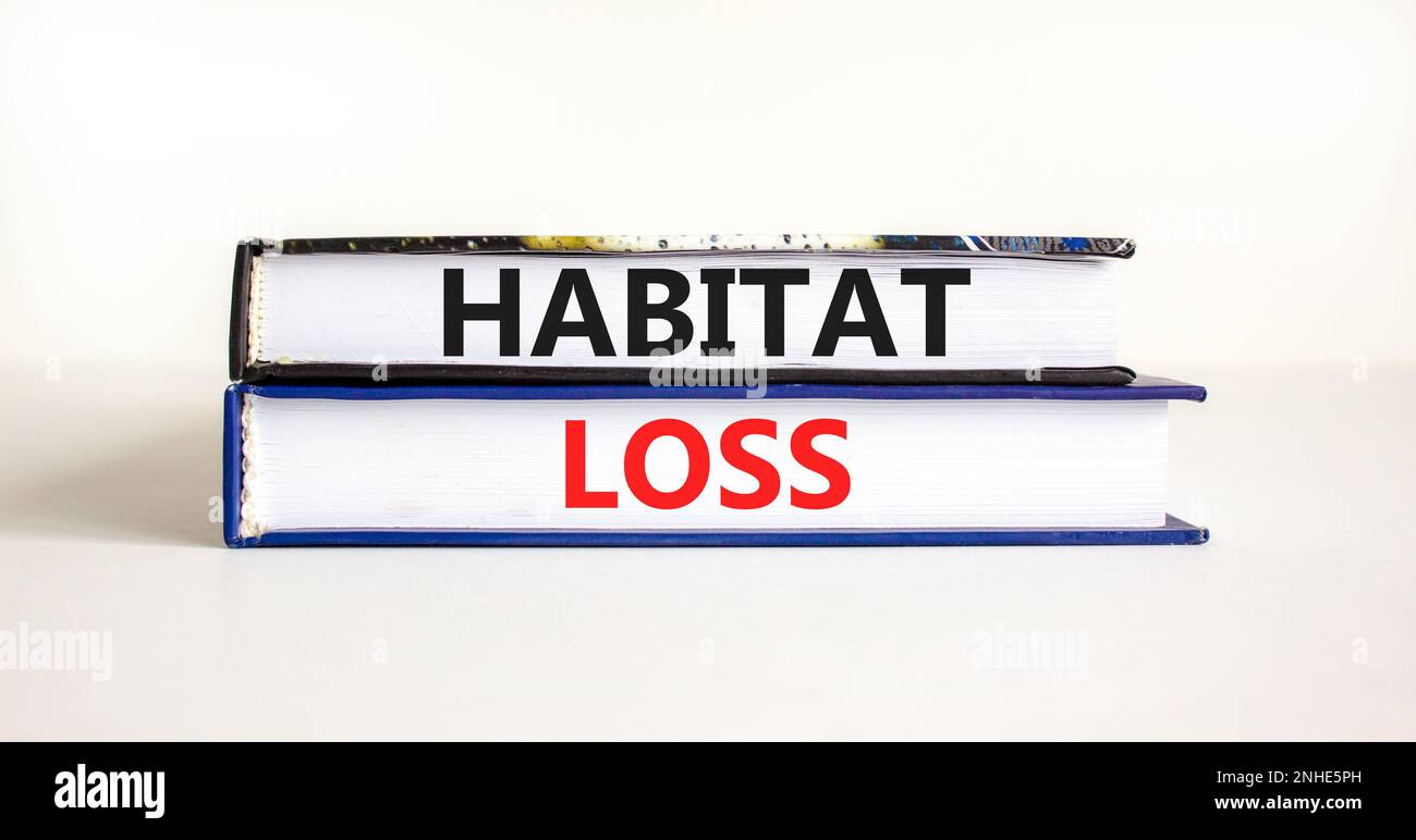Habitat loss symbol. Concept words Habitat loss on books. Beautiful white table white background