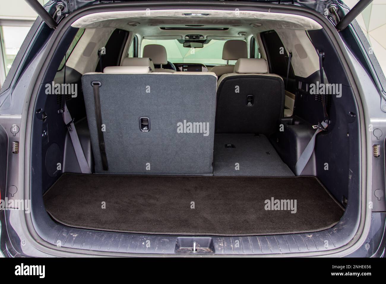 Huge, clean and empty car trunk in interior of compact suv. Rear view