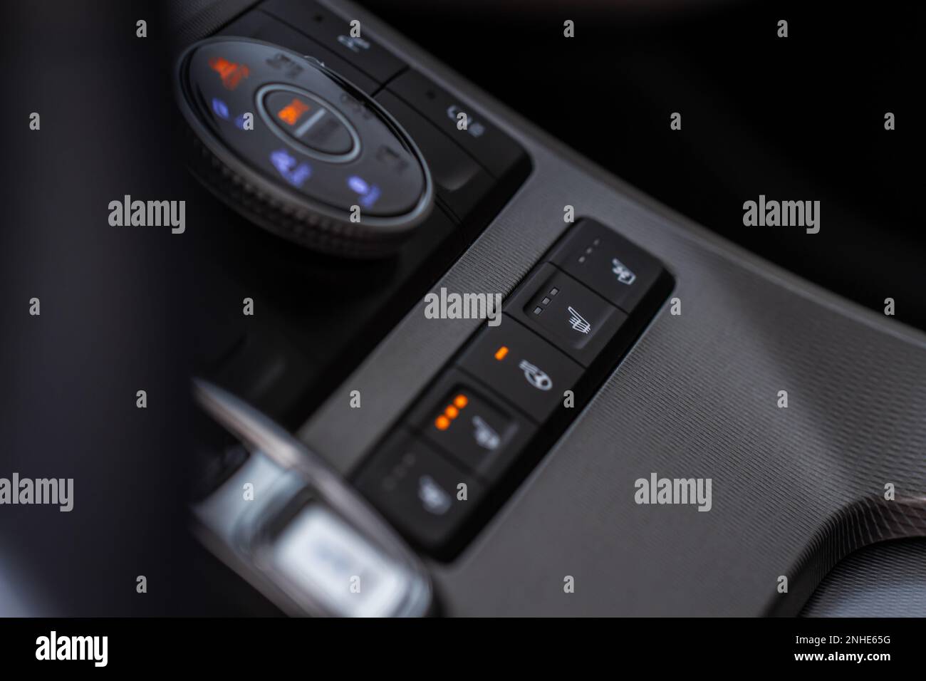 Seat heater button. Seat heating in the car switched on Stock Photo Alamy