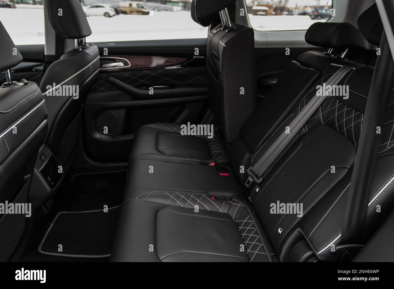 Modern SUV car inside. Leather back passenger seats in modern luxury