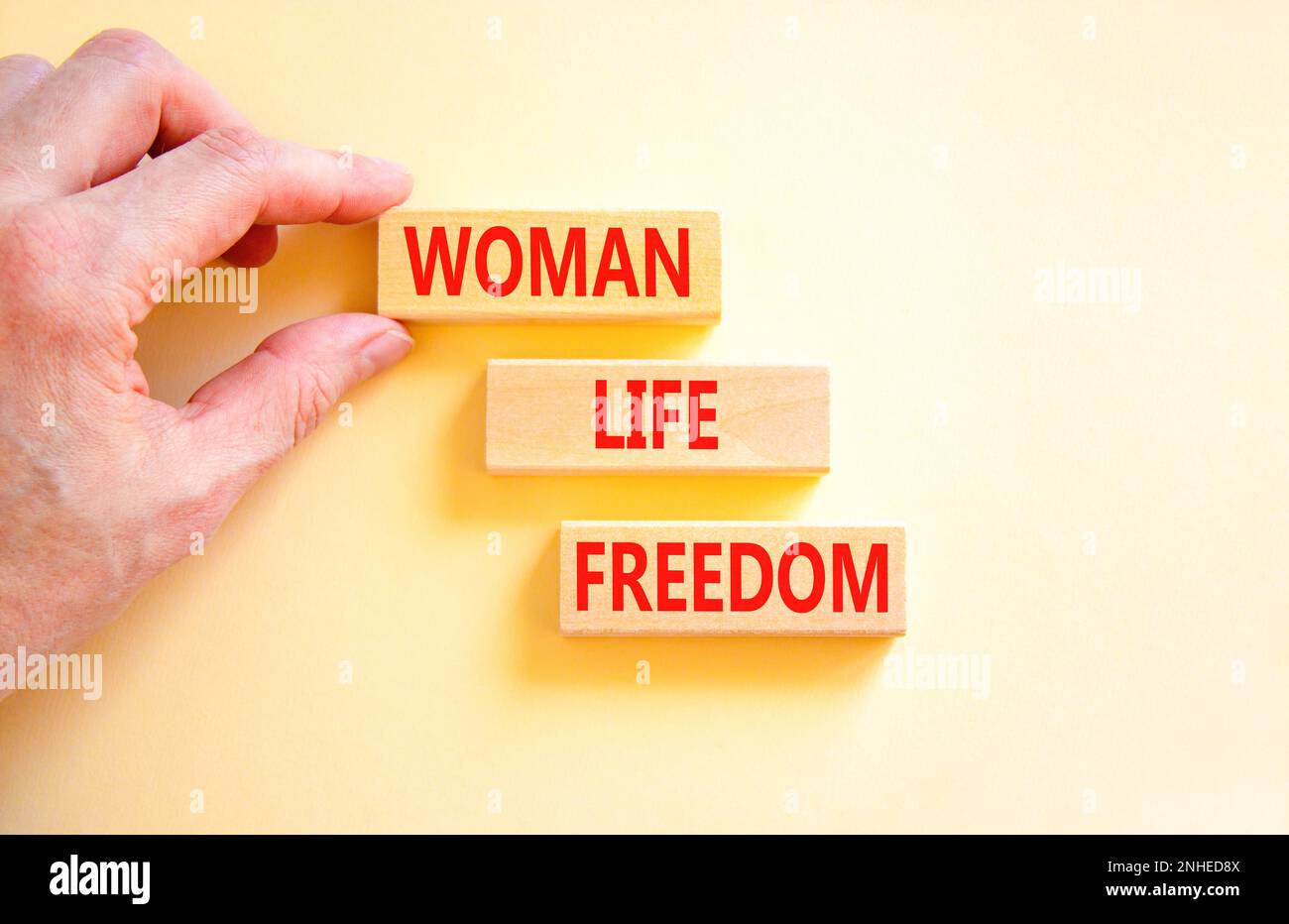 Woman life freedom symbol. Concept words Woman Life Freedom on wooden ...