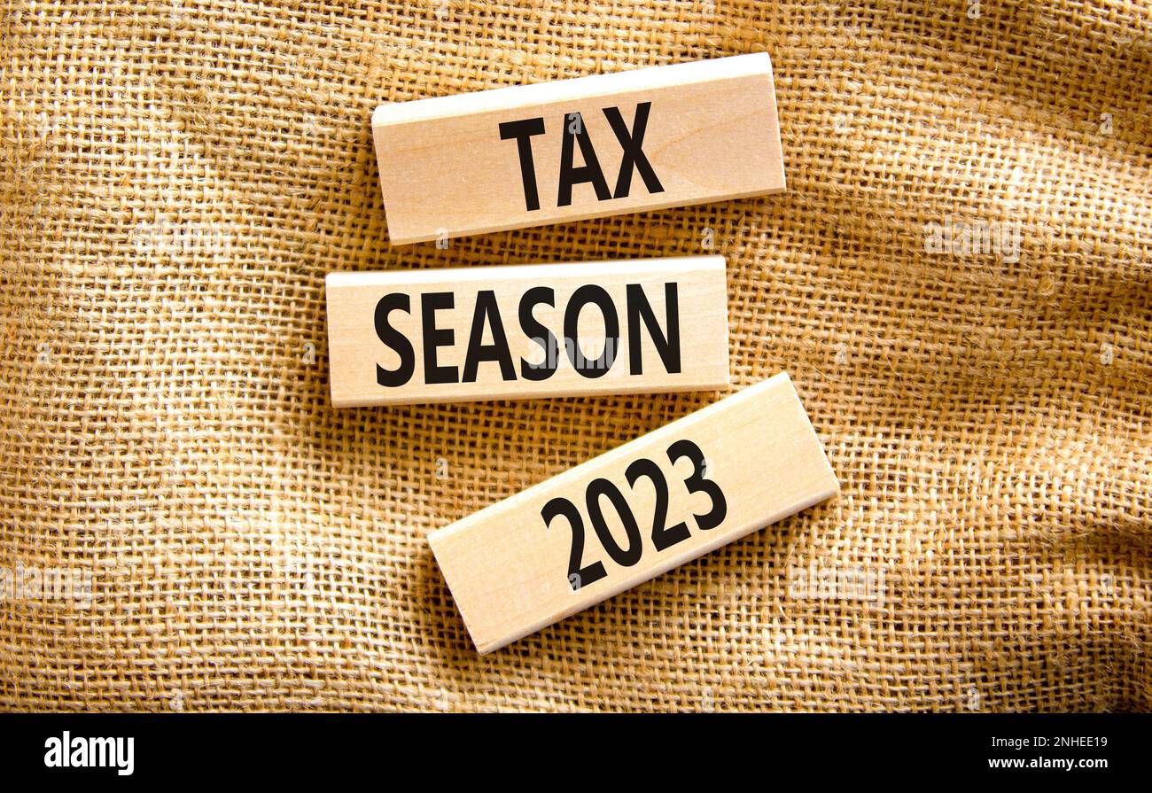 Tax season 2023 symbol. Concept words Tax season 2023 on wooden blocks