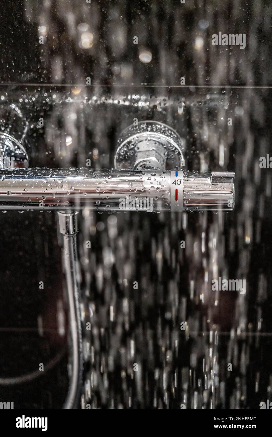 Shower, fitting, temperature control, temperature control of the shower water Stock Photo Alamy