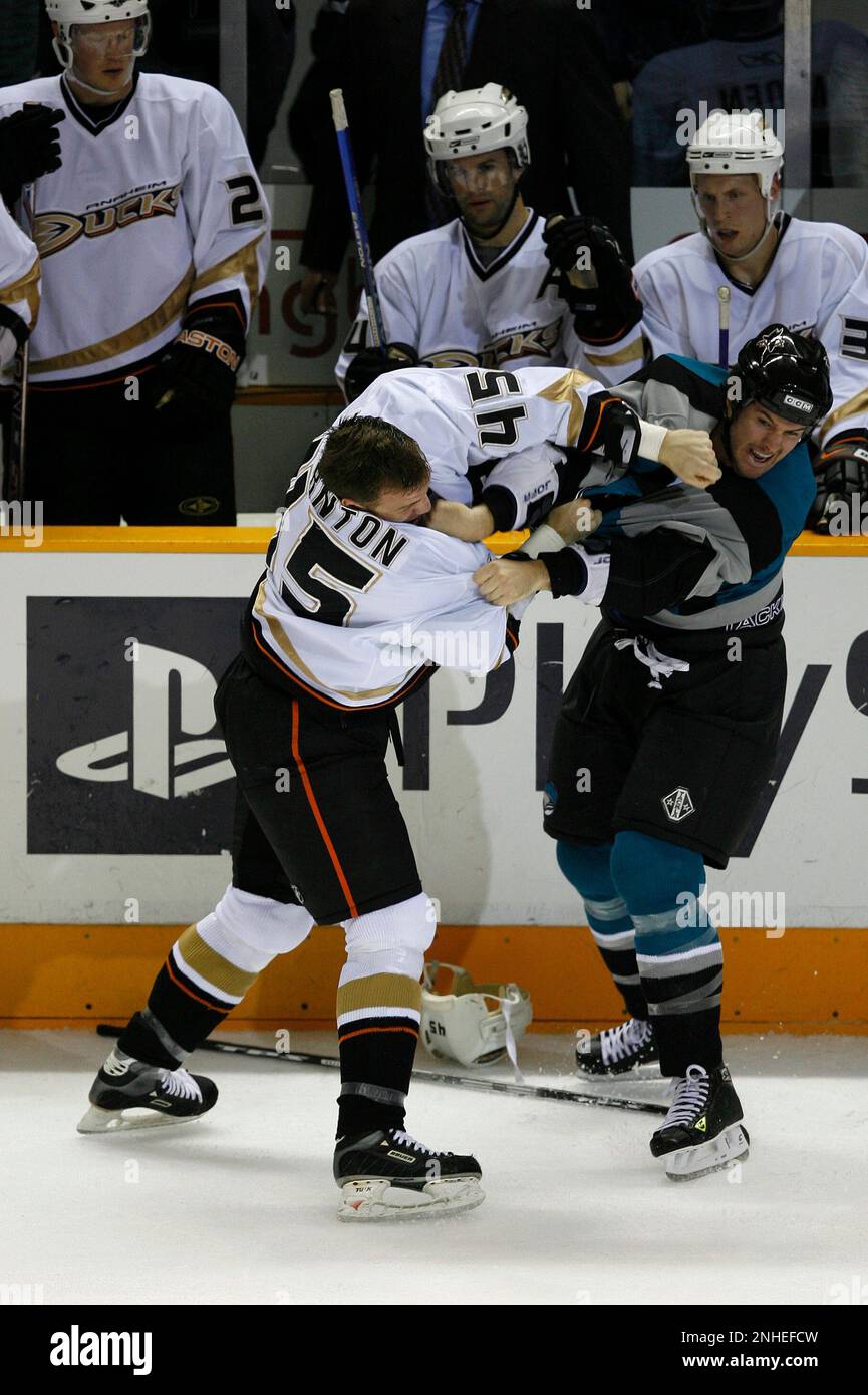 https://c8.alamy.com/comp/2NHEFCW/sharks-517-macjpg-sharks-7-mark-bell-and-ducks-45-shawn-thornton-both-get-a-major-penalty-for-fighting-at-the-end-ofthe-first-period-nhl-hockey-san-jose-sharks-vs-anaheim-mighty-ducks-event-in-san-jose-ca-on-122606-photo-by-michael-macor-san-francisco-chronicle-ran-on-12-27-2006-christian-ehrhoff-slips-the-sharks-first-goal-past-goalie-jean-sebastien-giguere-of-the-ducks-who-left-the-game-with-a-groin-injury-late-in-the-second-period-michael-macorsan-francisco-chronicle-via-ap-2NHEFCW.jpg