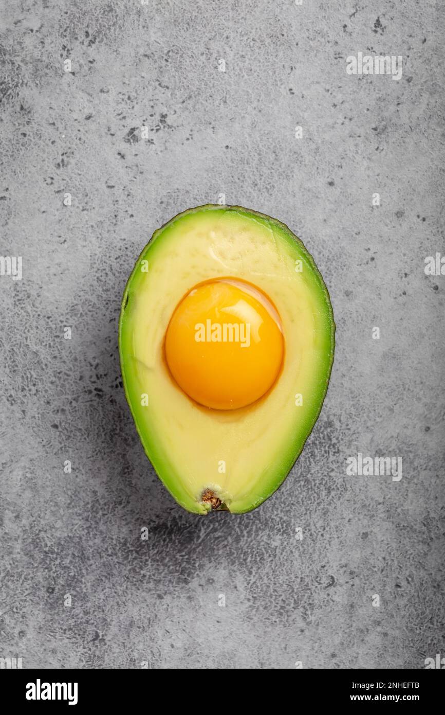 Foods rich in healthy fats for balanced nutrition raw egg yolk in