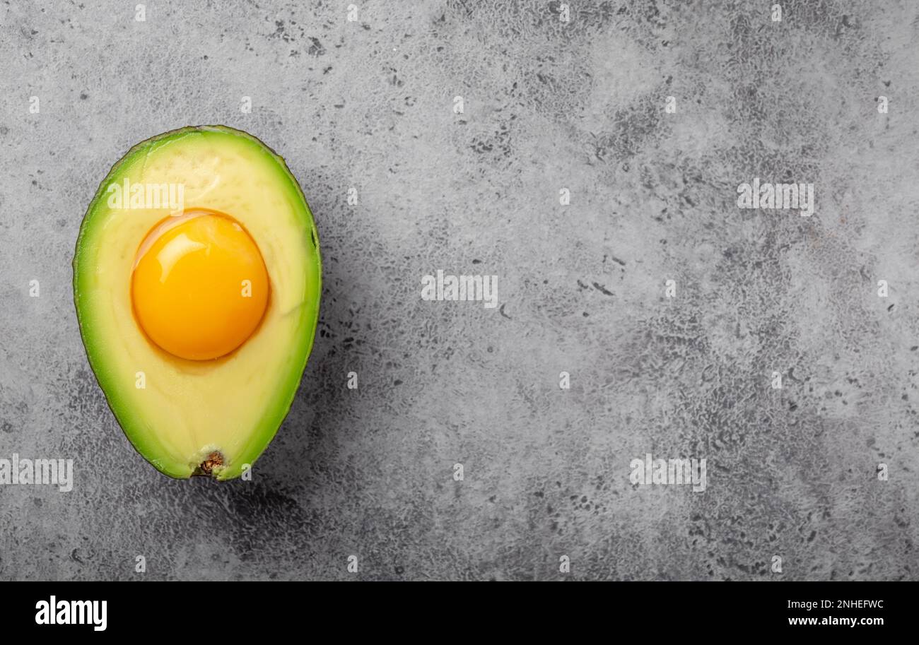 Foods rich in healthy fats for balanced nutrition raw egg yolk in