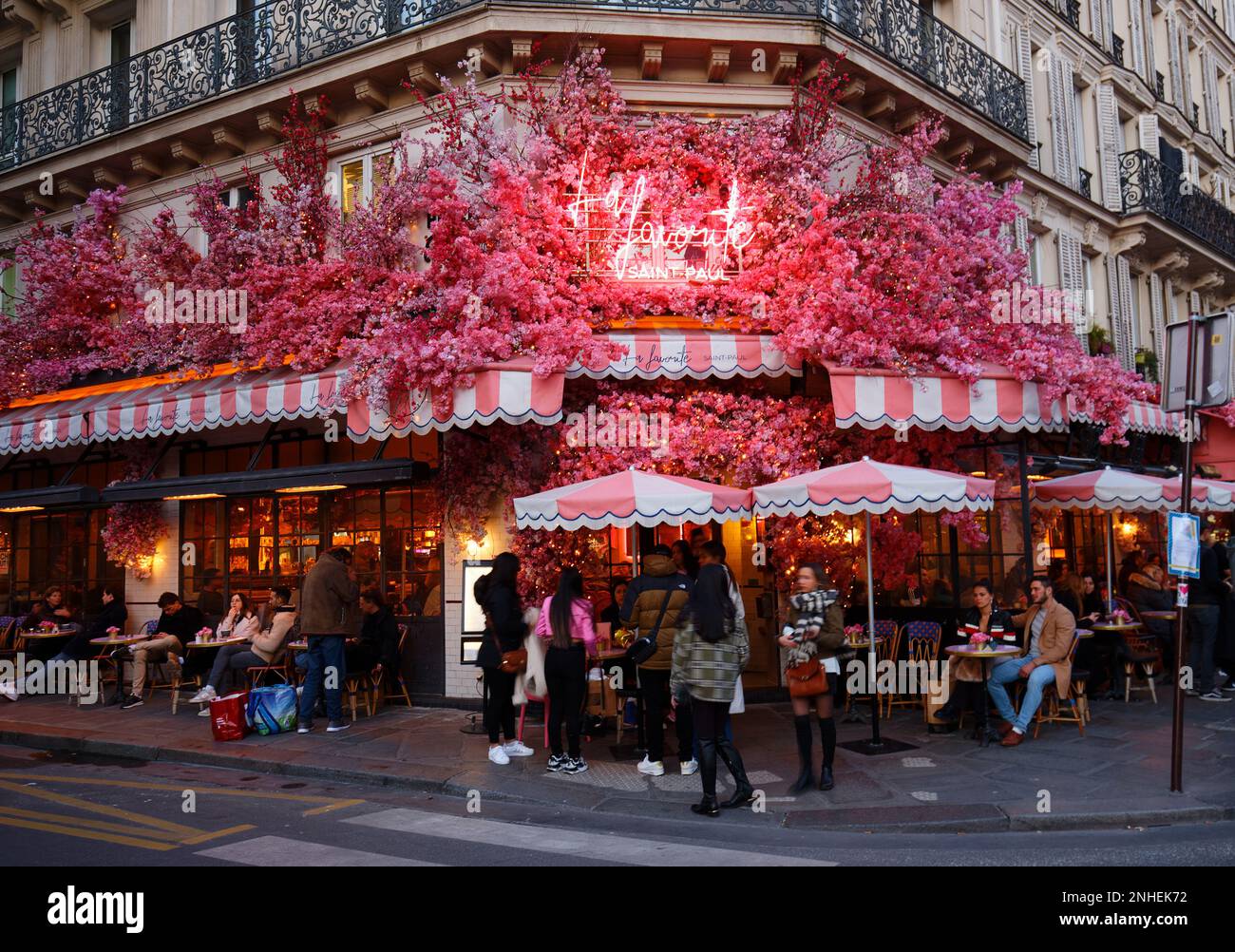 The traditional French cafe Favorite decorated with flowers . It