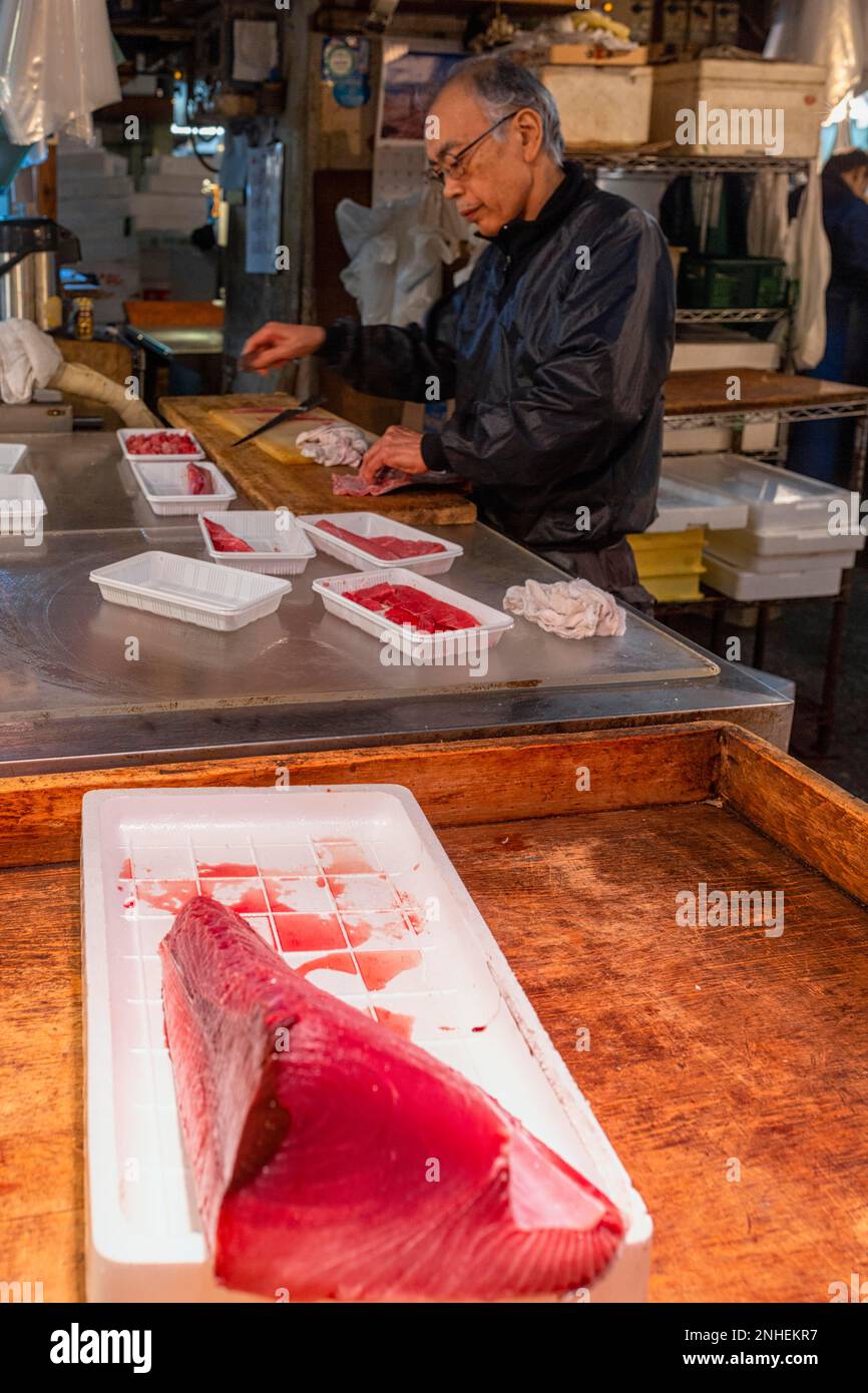 Tokyo Japan. Fish Market. Fishmonger at his stall Stock Photo Alamy