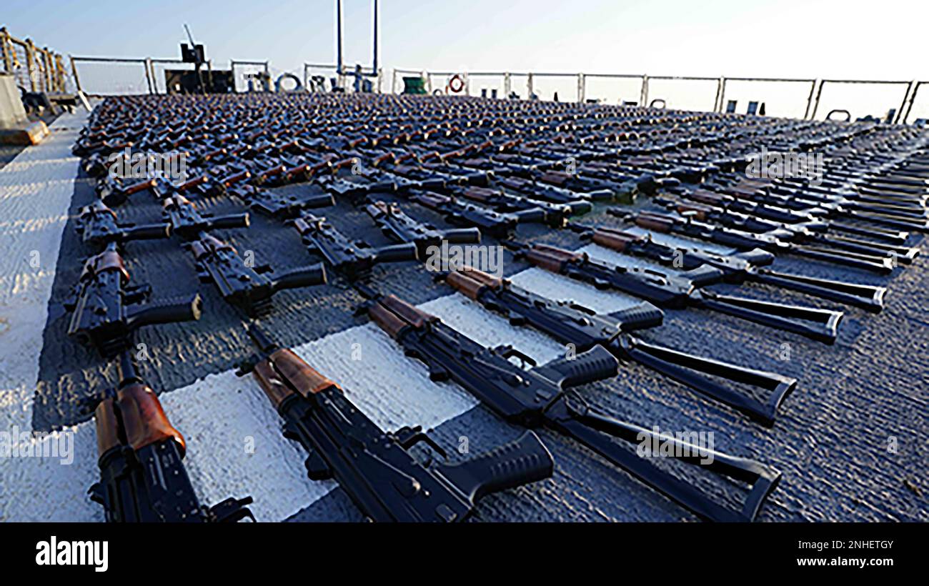 In this photo release by the U.S. Navy, hundreds of AK-47 assault ...