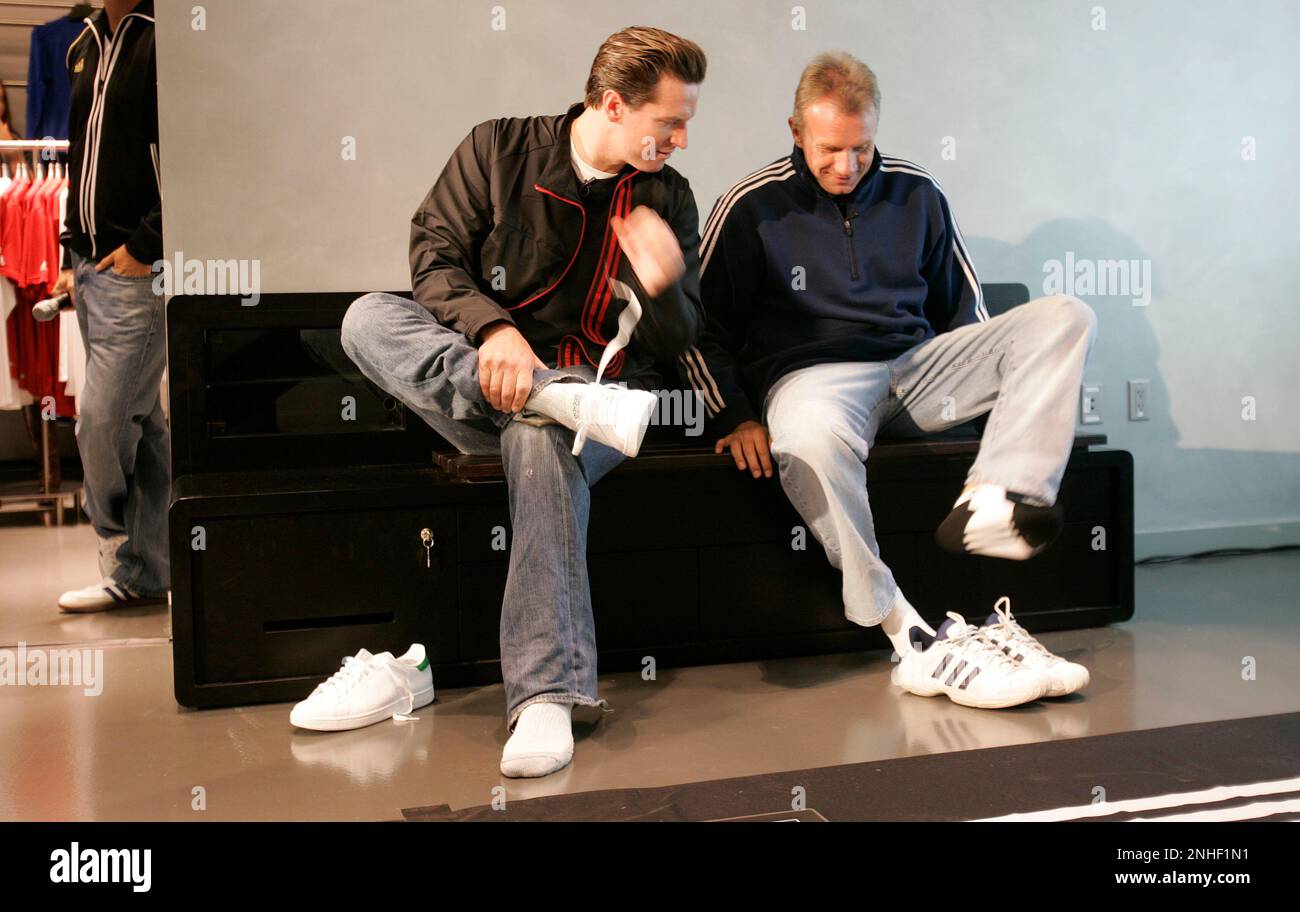 adidas30 016 mac.jpg SF Mayor Gavin Newsom and footbal great Joe Montana,  prepare to be fitted for the new "mi adidas" shoe the company is just  coming out with. 49ers legend Joe
