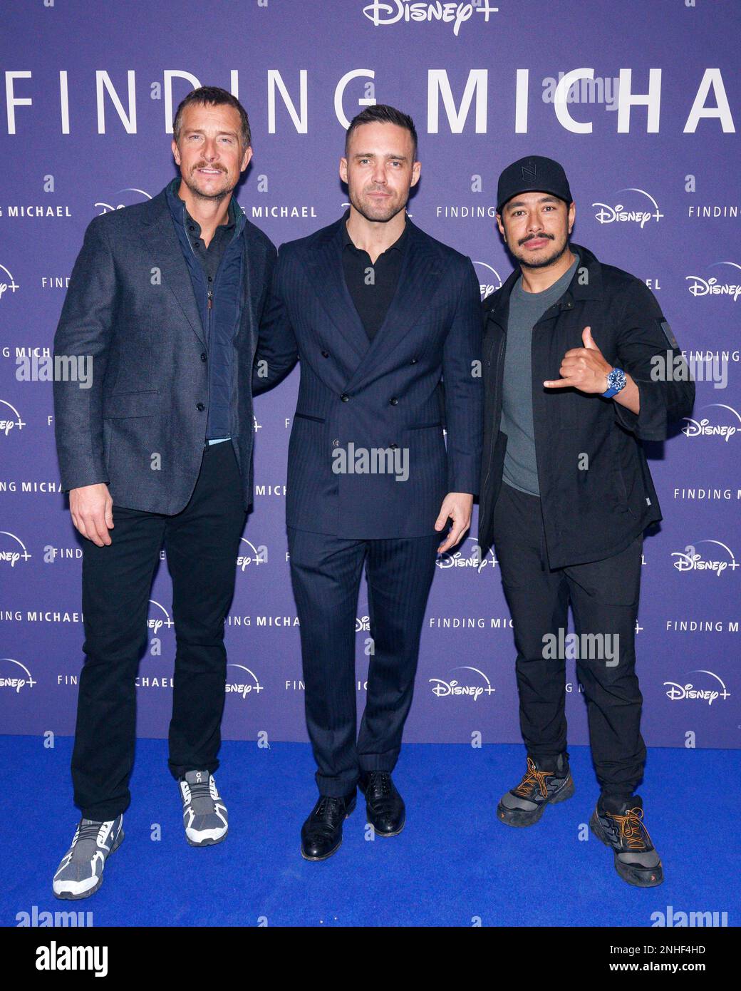 (left to right) Bear Grylls, Spencer Matthews and Nims Purja attending the premiere of the documentary, Finding Michael, at the Dolby Cinema At The Cinema In The Power Station, Battersea Power Station, London. Picture date: Tuesday February 21, 2023. Stock Photo