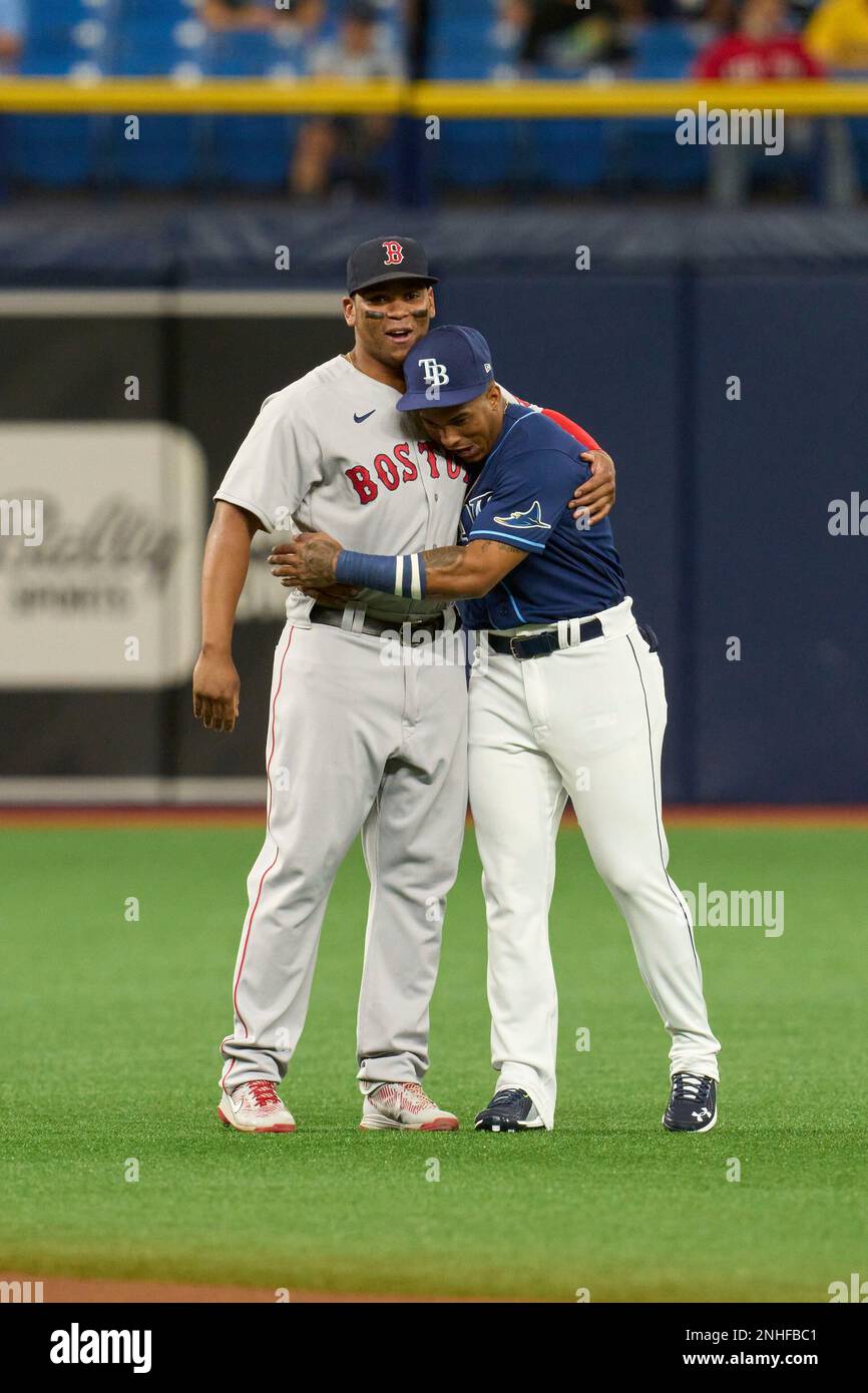 Tampa Bay Rays Wander Franco (5) hugs Rafael Devers (11) before an MLB game  against the Boston Red Sox on June 22, 2021 at Tropicana Field in St.  Petersburg, Florida. (Mike Janes/Four