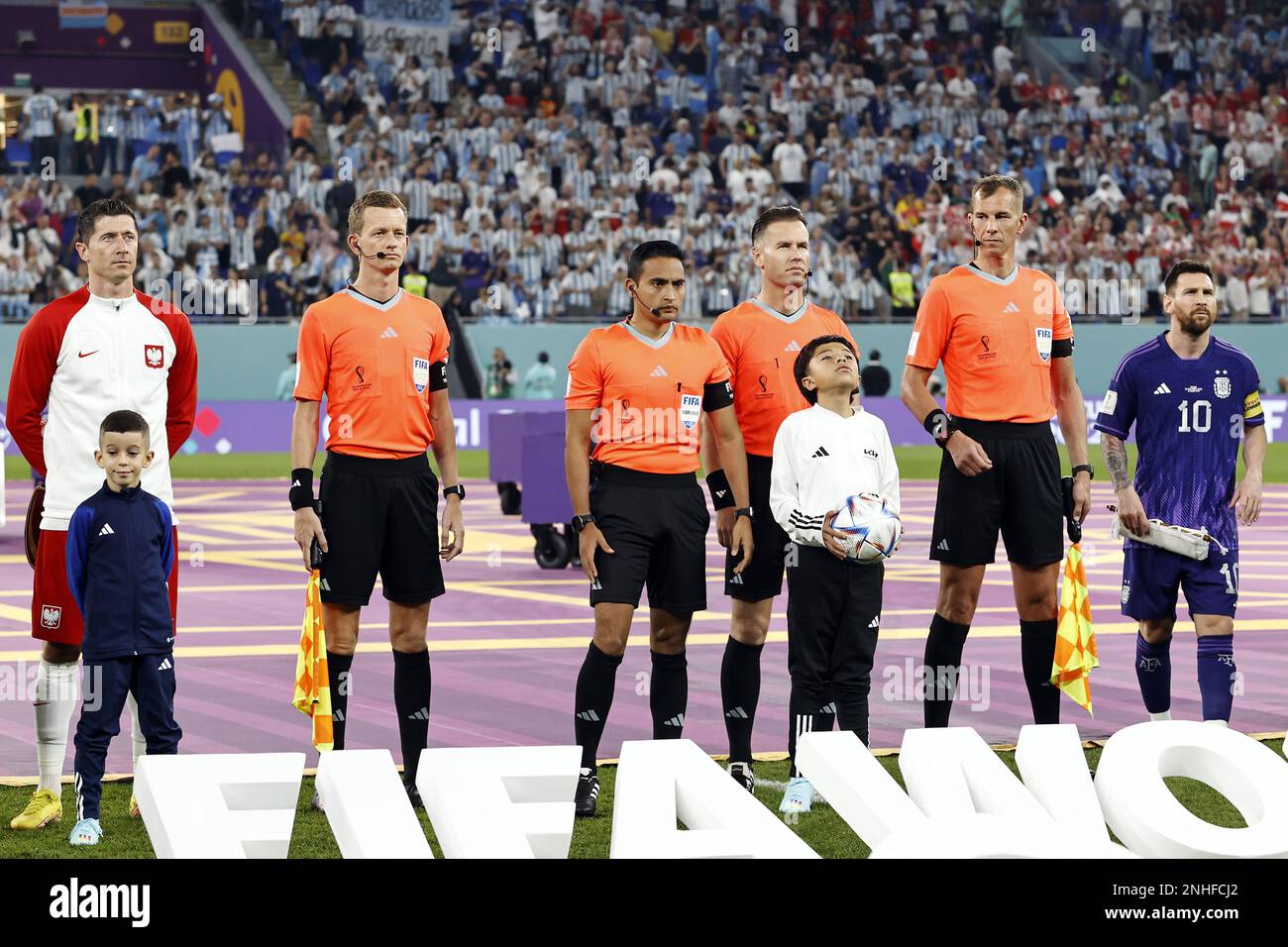 DOHA - (LR) Robert Lewandowski of Poland, assistant referee Jan de ...