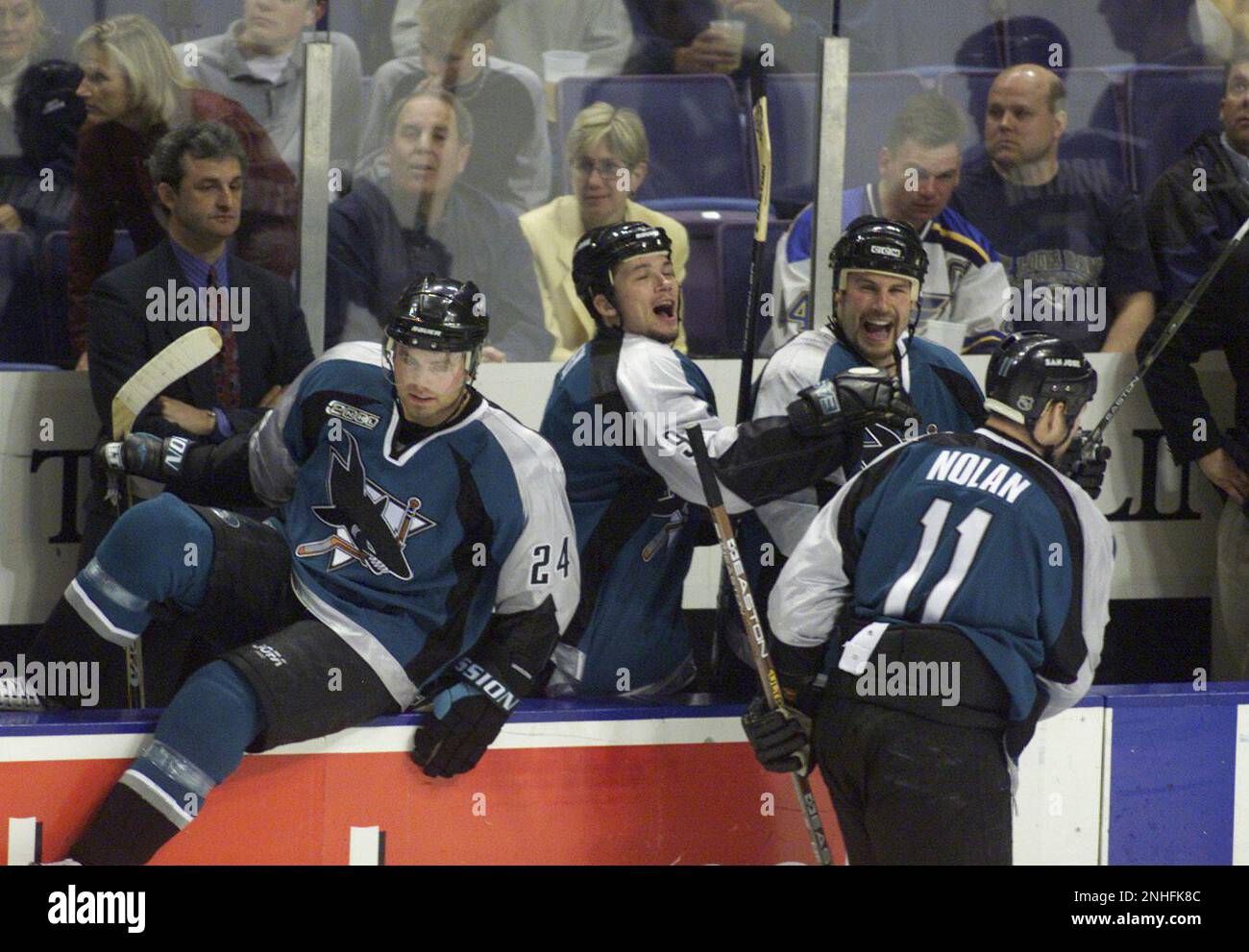 SHARKS2-C-25APR00-SP-MAC San Jose Sharks v. St. Louis Blues. Game 7 of the  playoffs. San Jose Shark #11 Owen Nolan is cheered by teammates #9 (left)  Todd Harvey and #22 Ronnie Stern after