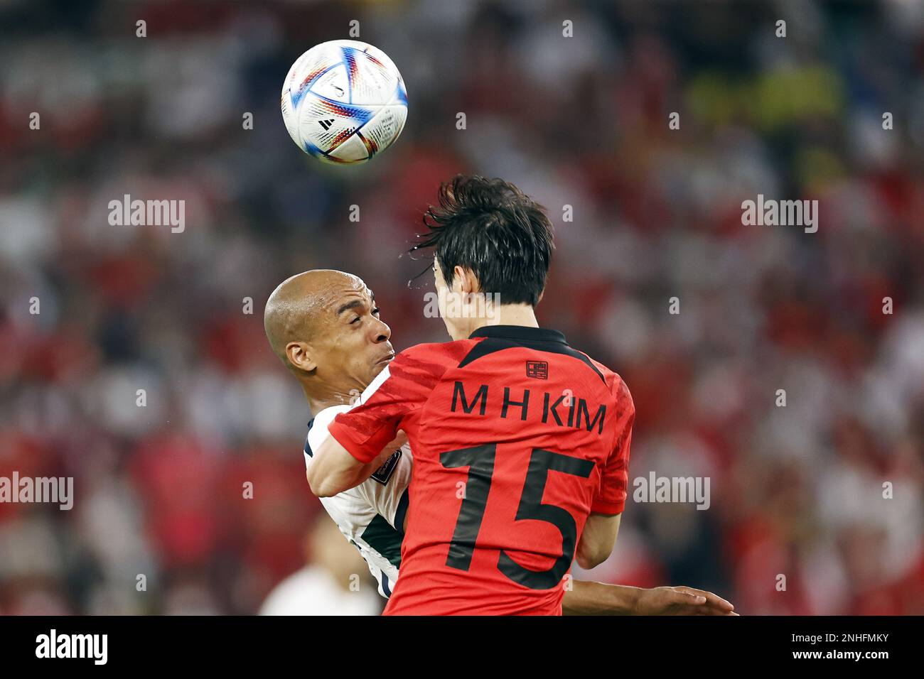DOHA - (l-r) Joao Mario of Portugal, Moon-hwan Kim of Korea Republic during the FIFA World Cup Qatar 2022 group H match between South Korea and Portugal at Education City Stadium on December 2, 2022 in Doha, Qatar. AP | Dutch Height | MAURICE OF STONE Stock Photo