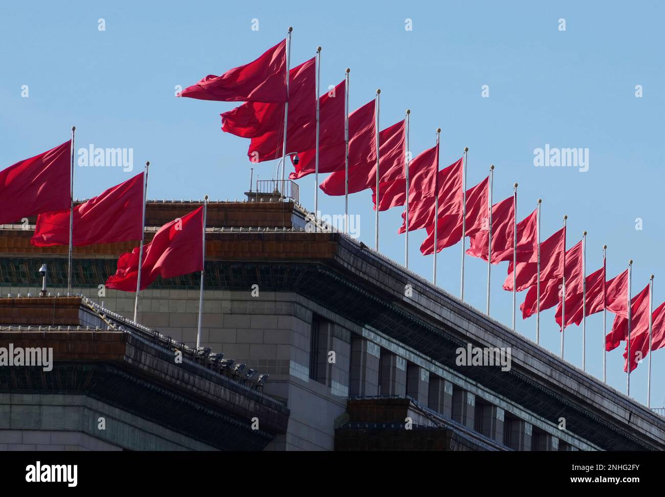 The red flags are streamed in the wind on the rooftop at Great Hall of ...
