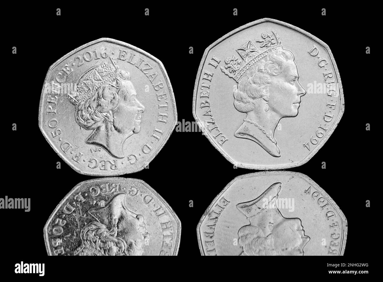 Size comparison between the old large 50p coin & the smaller new 50p