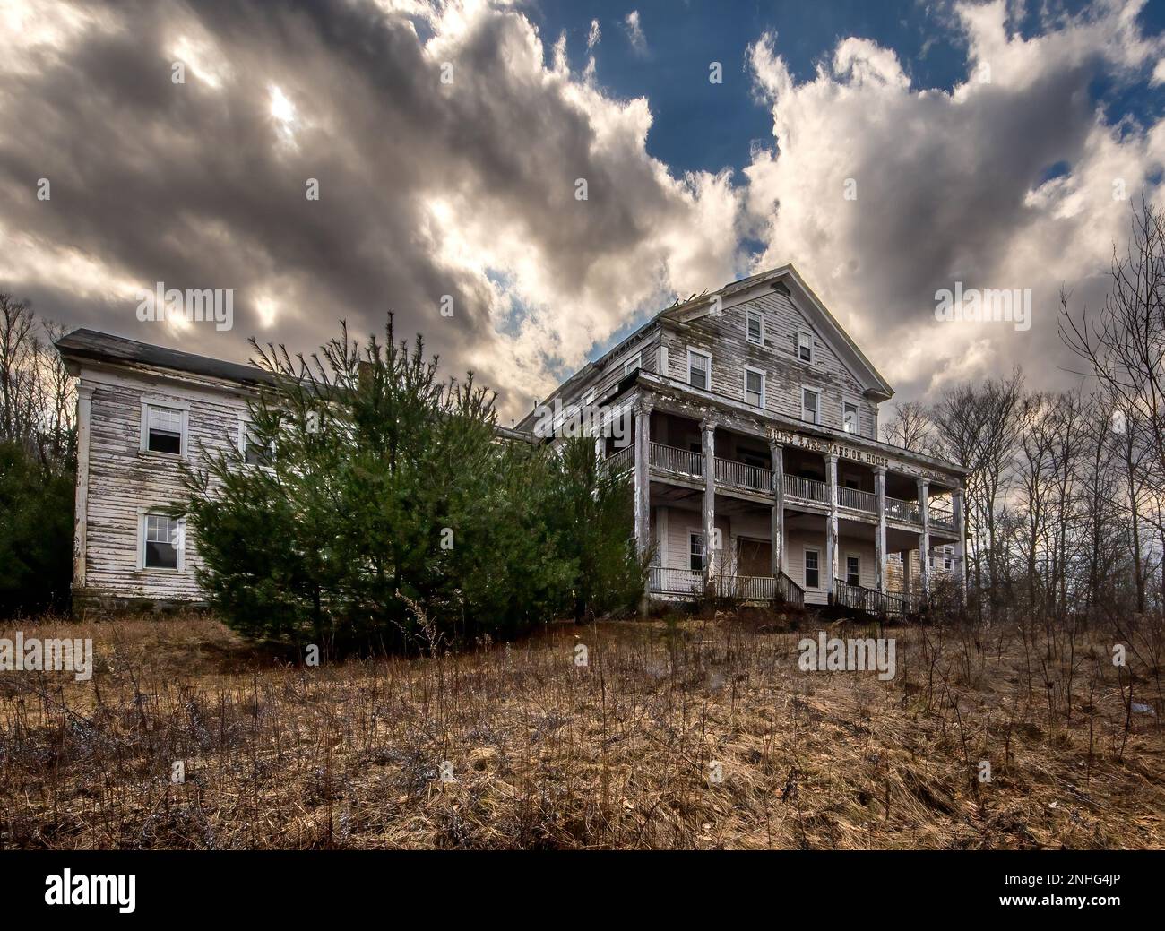 White Lake, NY USA Feb 20, 2023 Horizontal view of the rotting wooden ruins of the White