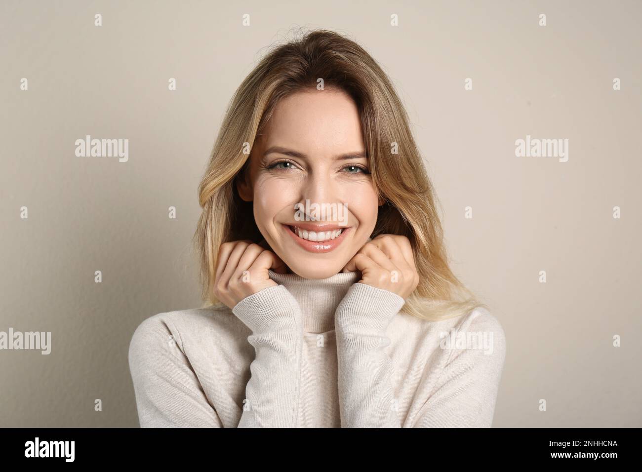 Beautiful blonde woman lovely smile hi-res stock photography and