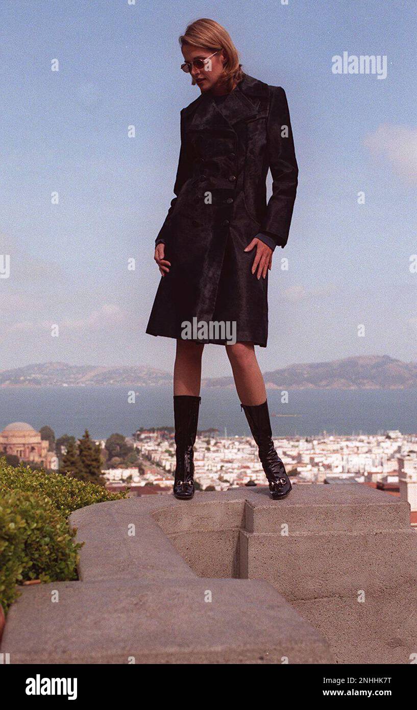 BOOTS1/C/16OCT95/DD/MACOR MIDCALF: GUCCI METALLIC MIDNIGHT BLUE PATENT  BOOTS, $495; MIDNIGHT BLUE COAT $4,195. AT GUCCI Chronicle Photo: Michael  Macor (MICHAEL MACOR/San Francisco Chronicle via AP Stock Photo - Alamy