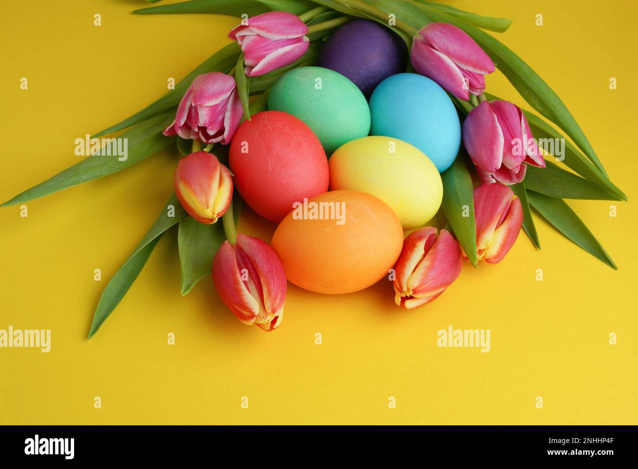 Easter eggs on straw. Cute angel egg lying on hay, greeting festive card on  springtime religious holiday Stock Photo by ©georgeeb22 454641572