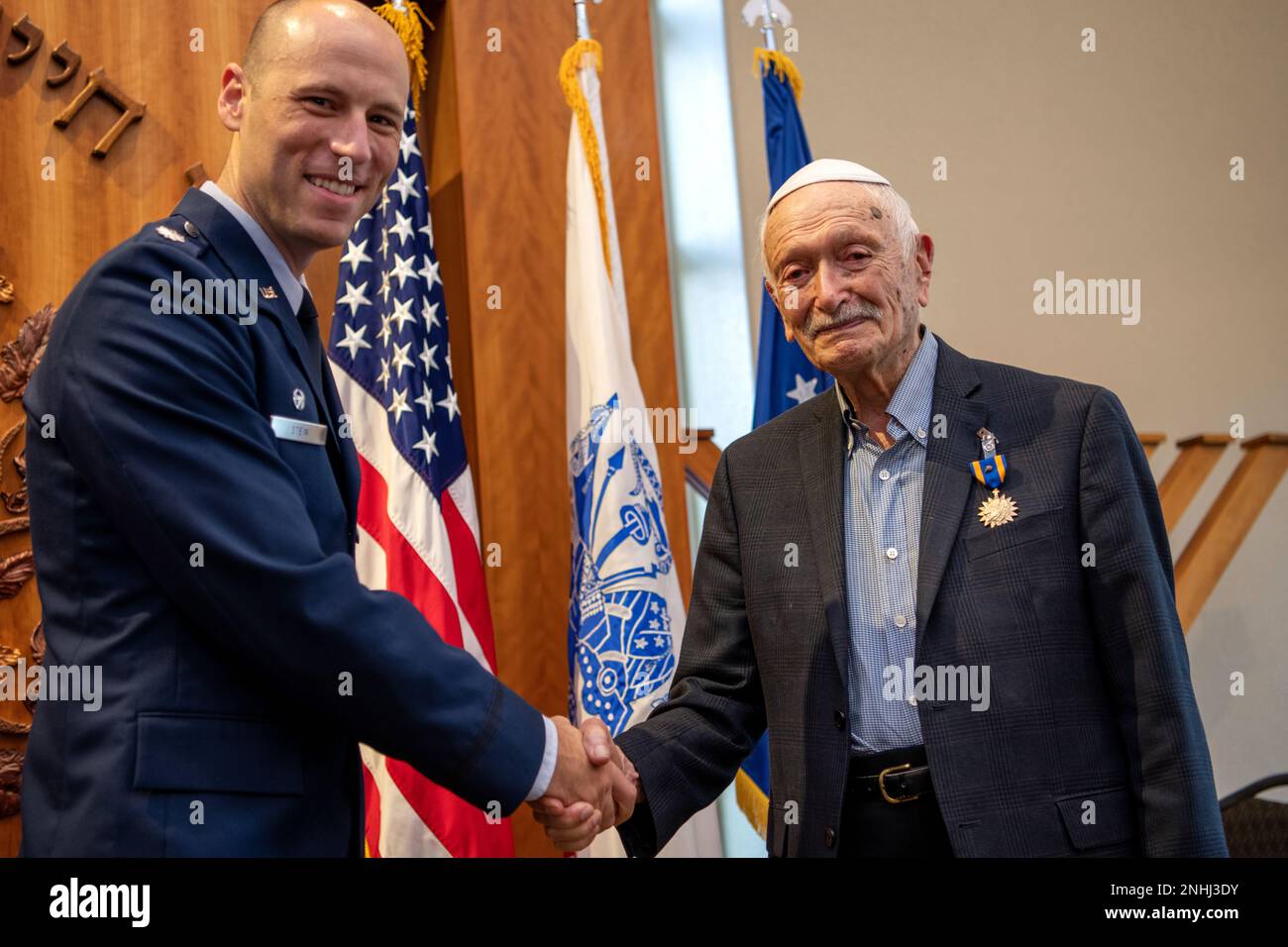 U.S. Air Force Lt. Col. Stein (left), 502nd Operations Support Squadron commander, presents U.S. Army Air Corps 1st Lt. Gerald Teldon, retired, with the Air Medal for his honorable service as a pilot on July 29, 2022, at the Chabad Center for Jewish Life and Learning, San Antonio, Texas. Teldon, born in the Bronx, N.Y., in 1924, joined the military in 1944. He completed 62 missions during WWII and the Korean War. Lt. Col. Andrew Stein, 502nd Operations Support Squadron commander, was the presiding officer. The awards presented to Teldon are as follows: the Air Medal; American Campaign Medal; E Stock Photo