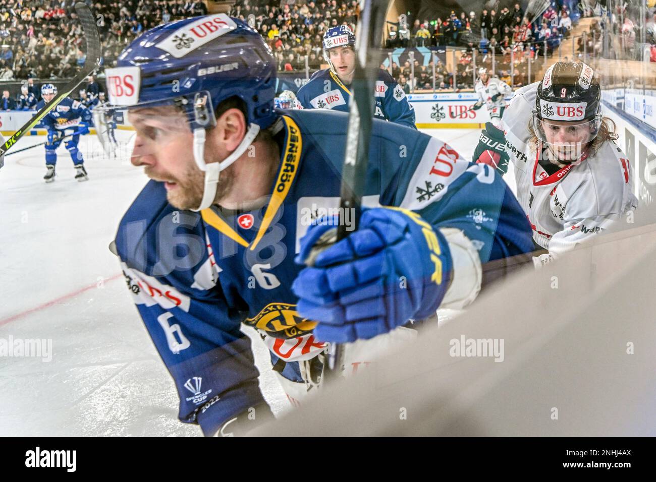Davos Klas Dahlbeck, left, against Canadas Cody Eakin during the game between Switzerlands HC Davos and Team Canada, at the 94th Spengler Cup ice hockey tournament in Davos, Switzerland, Tuesday, Dec