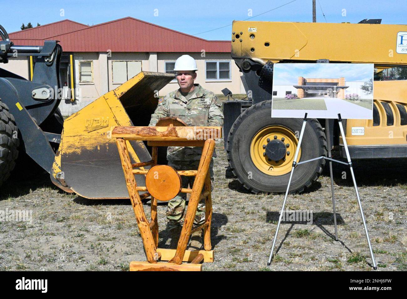 Fort Wainwright Garrison Commander Col. Nate Surrey makes remarks at the groundbreaking ceremony for the new Community Activity Center July 29. The Morale, Welfare and Recreation facility will house an indoor play area, family fitness facility, bowling alley, electronic and traditional gaming areas, and food and beverage options. It is set to open in spring 2024. (Photo by Grant Sattler, Fort Wainwright Public Affairs Office) Stock Photo