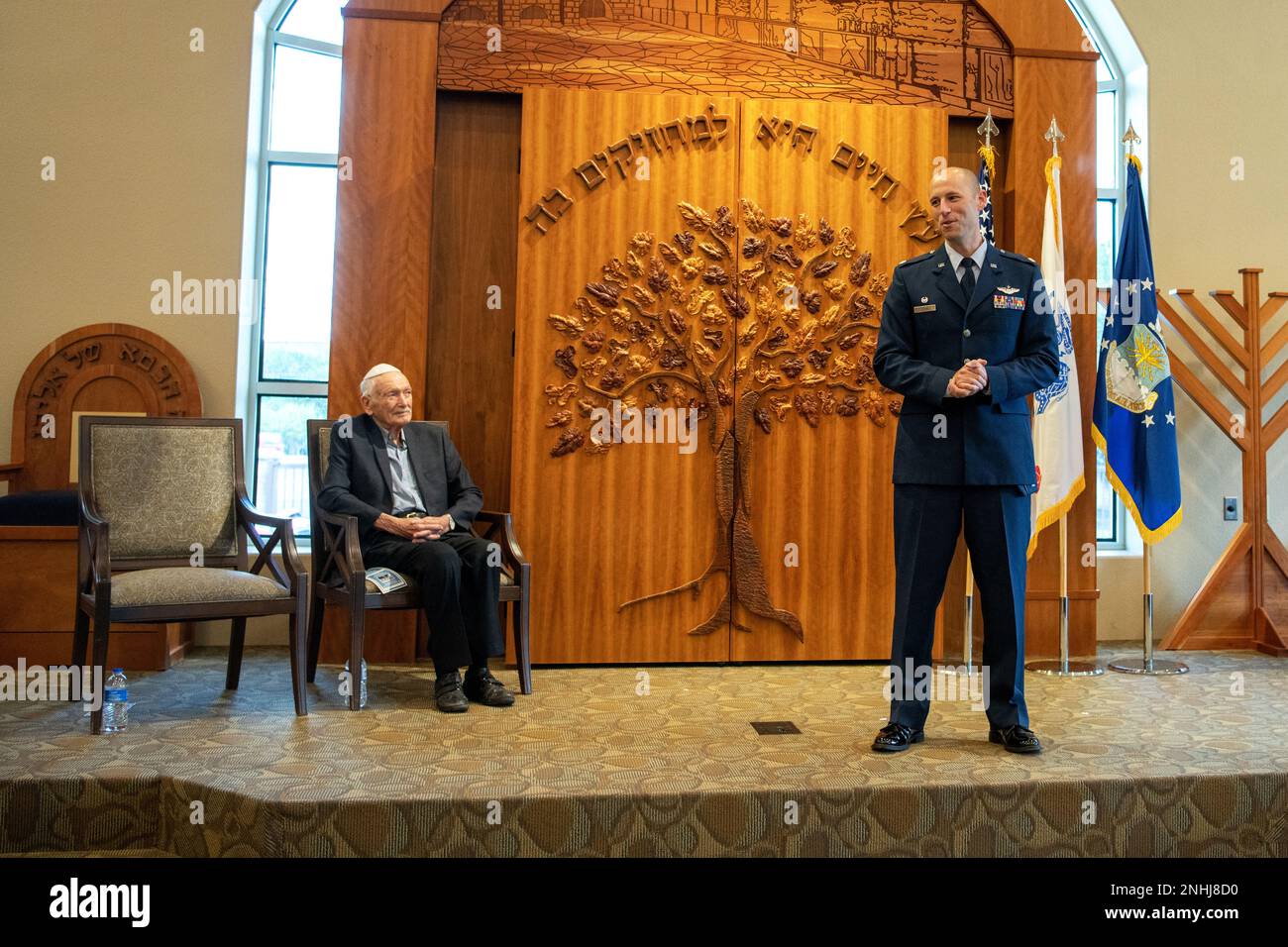 U.S. Air Force Lt. Col. Stein (right), 502nd Operations Support Squadron commander, provides opening remarks during U.S. Army Air Corps 1st Lt. Gerald Teldon’s, retired, award ceremony for his honorable service as a pilot on July 29, 2022, at the Chabad Center for Jewish Life and Learning, San Antonio, Texas. Teldon, born in Bronx, N.Y., in 1924, joined the military in 1944. He completed 62 missions during WWII and the Korean War. Lt. Col. Andrew Stein, 502nd Operations Support Squadron commander, was the presiding officers. The awards presented to Teldon are as follows: the Air Medal; America Stock Photo