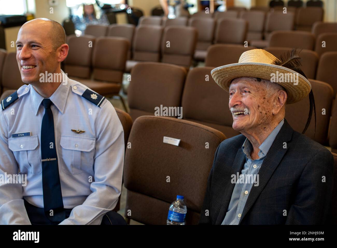 U.S. Air Force Lt. Col. Stein (left), 502nd Operations Support Squadron commander, talks with U.S. Army Air Corps 1st Lt. Gerald Teldon, retired, before Teldon’s award ceremony for his honorable service as a pilot on July 29, 2022, at the Chabad Center for Jewish Life and Learning, San Antonio, Texas. Teldon, born in Bronx, N.Y., in 1924, joined the military in 1944. He completed 62 missions during WWII and the Korean War. Lt. Col. Andrew Stein, 502nd Operations Support Squadron commander, was the presiding officers. The awards presented to Teldon are as follows: the Air Medal; American Campai Stock Photo