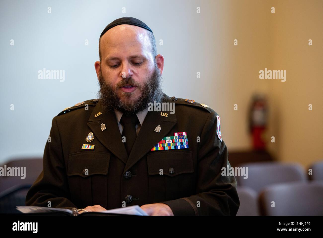 U.S. Army Chaplain Maj. Mendy Stern, Jewish Chaplain for JBSA and Brigade Chaplain, 103rd Signal Brigade, begins the awards ceremony for U.S. Army Air Corps 1st Lt. Gerald Teldon, retired, for his honorable service as a pilot on July 29, 2022, at the Chabad Center for Jewish Life and Learning, San Antonio, Texas. Teldon, born in Bronx, N.Y., in 1924, joined the military in 1944. He completed 62 missions during WWII and the Korean War. Lt. Col. Andrew Stein, 502nd Operations Support Squadron commander, was the presiding officers. The awards presented to Teldon are as follows: the Air Medal; Ame Stock Photo