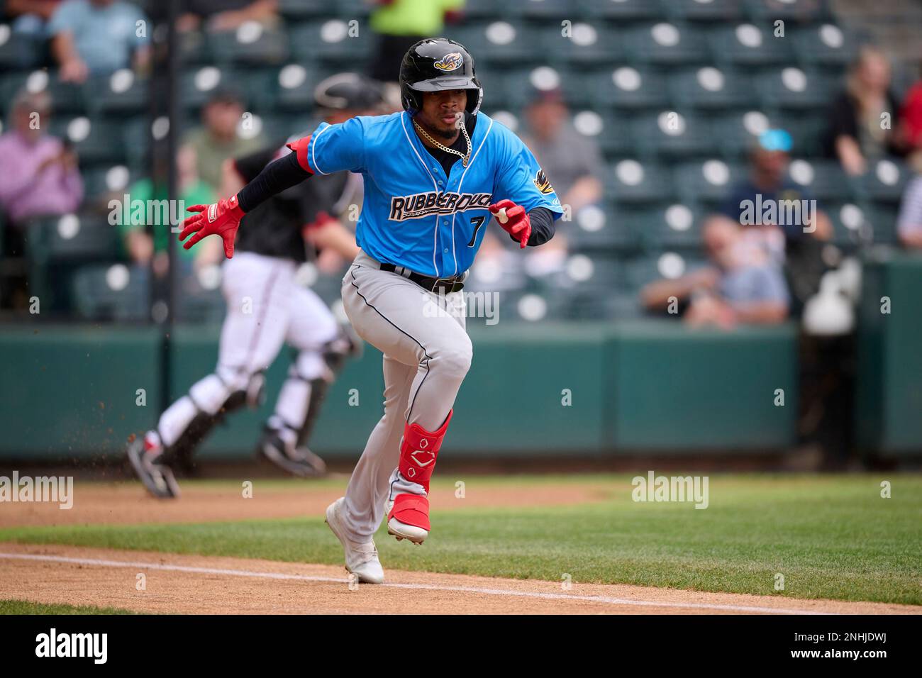 Akron RubberDucks Jose Tena (7) runs to first base on a bunt base hit
